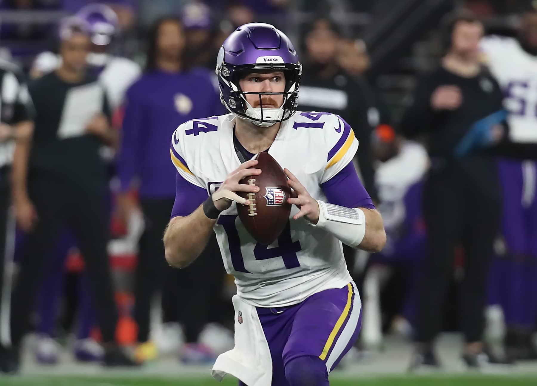GLENDALE, ARIZONA - JANUARY 13: Quarterback Sam Darnold #14 of the Minnesota Vikings looks to throw a pass during the second half of the Minnesota Vikings versus Los Angeles Rams NFL Wild Card football game at State Farm Stadium on January 13, 2025 in Glendale, Arizona. (Photo by Bruce Yeung/Getty Images)