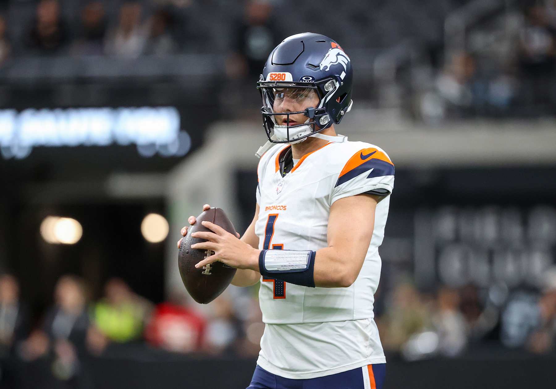 LAS VEGAS, NEVADA - NOVEMBER 24: Quarterback Zach Wilson #4 of the Denver Broncos warms up prior to a game against the Las Vegas Raiders at Allegiant Stadium on November 24, 2024 in Las Vegas, Nevada. (Photo by Ian Maule/Getty Images)