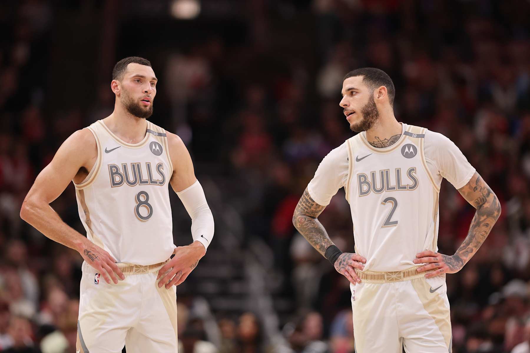 CHICAGO, ILLINOIS - DECEMBER 28: Zach LaVine #8 and Lonzo Ball #2 of the Chicago Bulls confer against the Milwaukee Bucks during the first half at the United Center on December 28, 2024 in Chicago, Illinois. NOTE TO USER: User expressly acknowledges and agrees that, by downloading and or using this photograph, User is consenting to the terms and conditions of the Getty Images License Agreement.  (Photo by Michael Reaves/Getty Images)