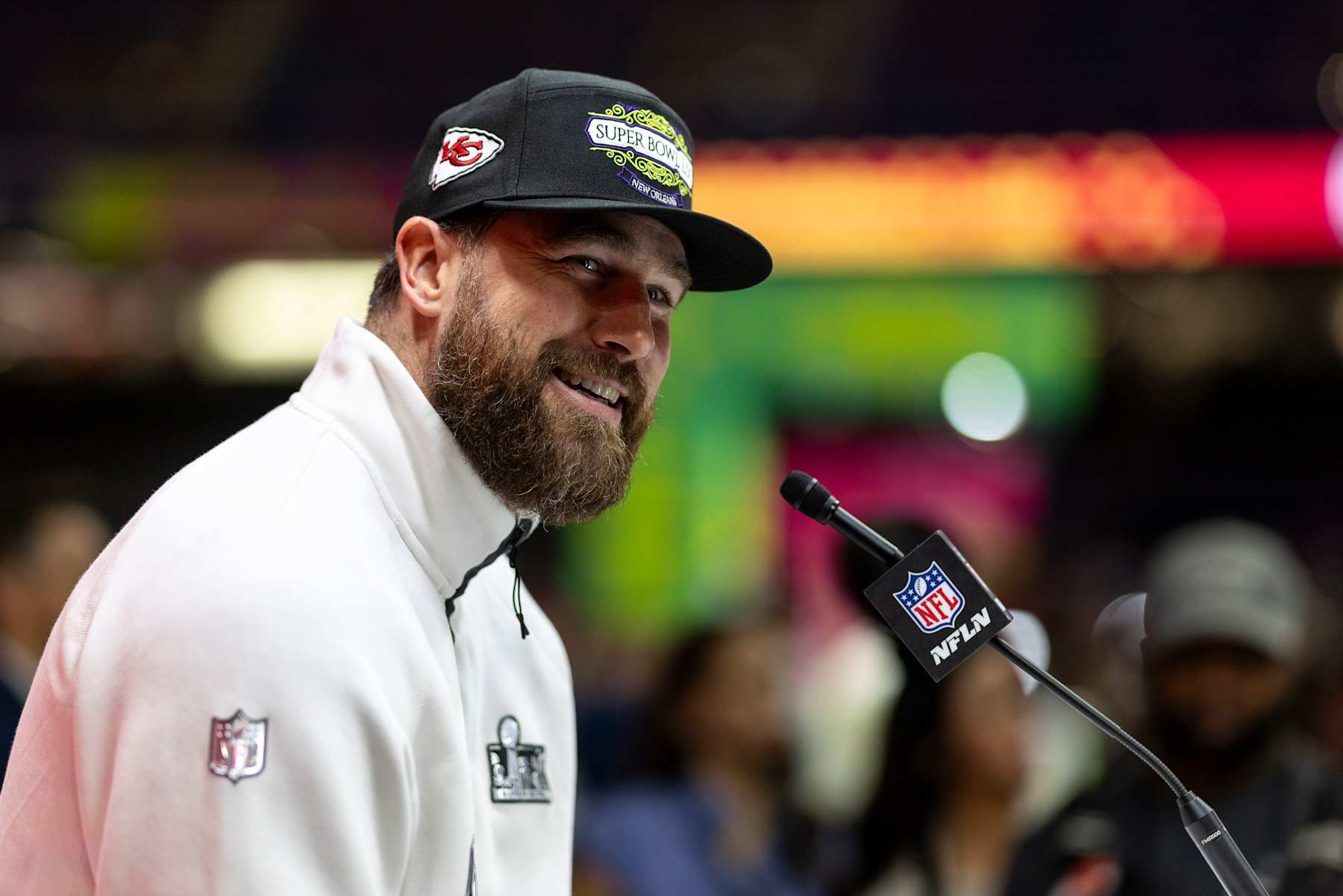 NEW ORLEANS, LOUISIANA - FEBRUARY 03: Travis Kelce #87 of the Kansas City Chiefs reacts as he does an interview during Super Bowl LIX Opening Night at Caesars Superdome on February 03, 2025 in New Orleans, Louisiana. (Photo by Michael Owens/Getty Images)