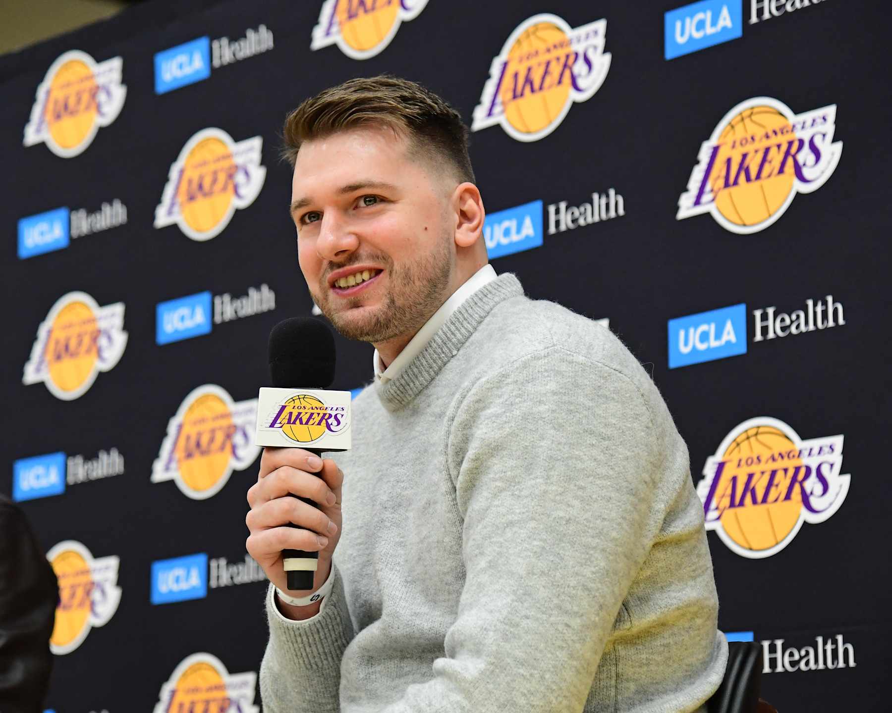 EL SEGUNDO, CA - FEBRUARY 04: Luka Doncic #77 of the Los Angeles Lakers is introduced during a press conference on February 04, 2025 at UCLA Health Training Center in El Segundo, California. NOTE TO USER: User expressly acknowledges and agrees that, by downloading and or using this photograph, User is consenting to the terms and conditions of the Getty Images License Agreement. Mandatory Copyright Notice: Copyright 2025 NBAE (Photo by Adam Pantozzi/NBAE via Getty Images)