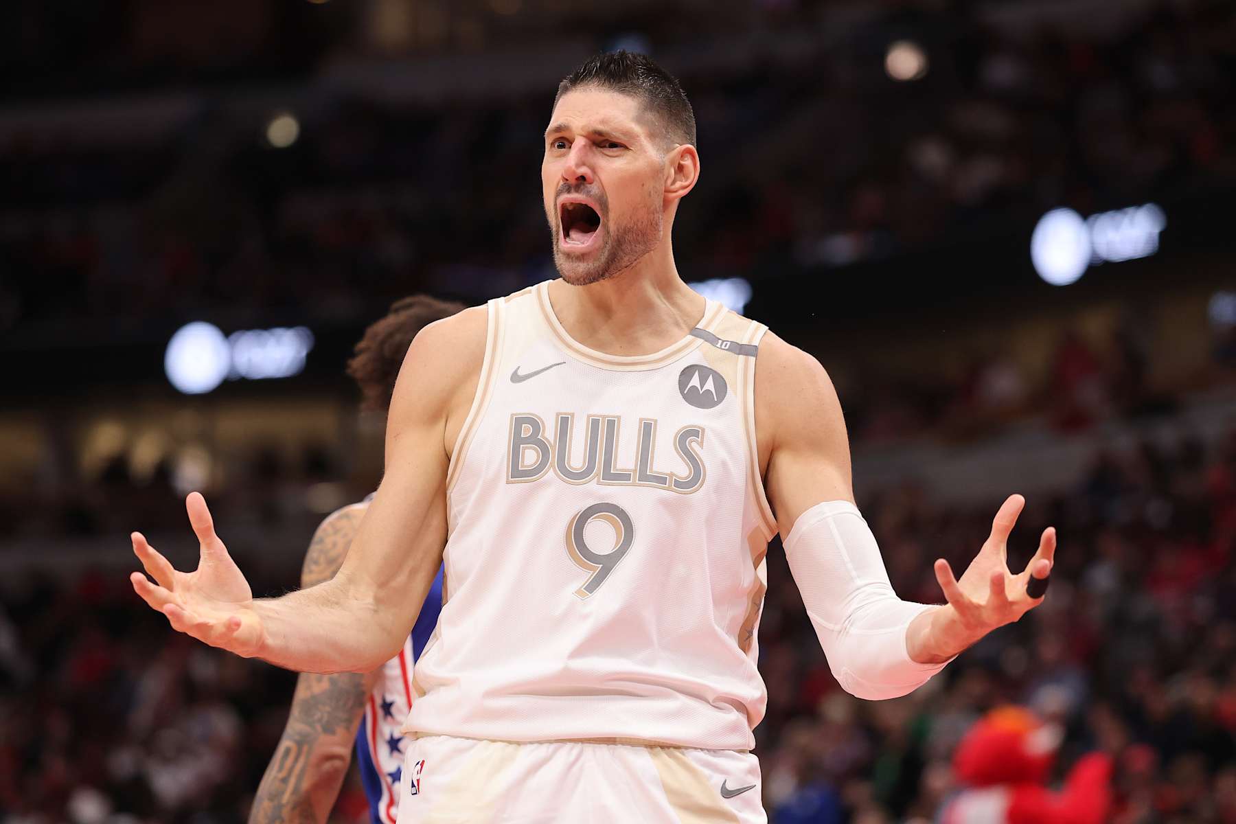 CHICAGO, ILLINOIS - JANUARY 25: Nikola Vucevic #9 of the Chicago Bulls reacts against the Philadelphia 76ers during the first half at the United Center on January 25, 2025 in Chicago, Illinois. NOTE TO USER: User expressly acknowledges and agrees that, by downloading and or using this photograph, User is consenting to the terms and conditions of the Getty Images License Agreement. (Photo by Michael Reaves/Getty Images)