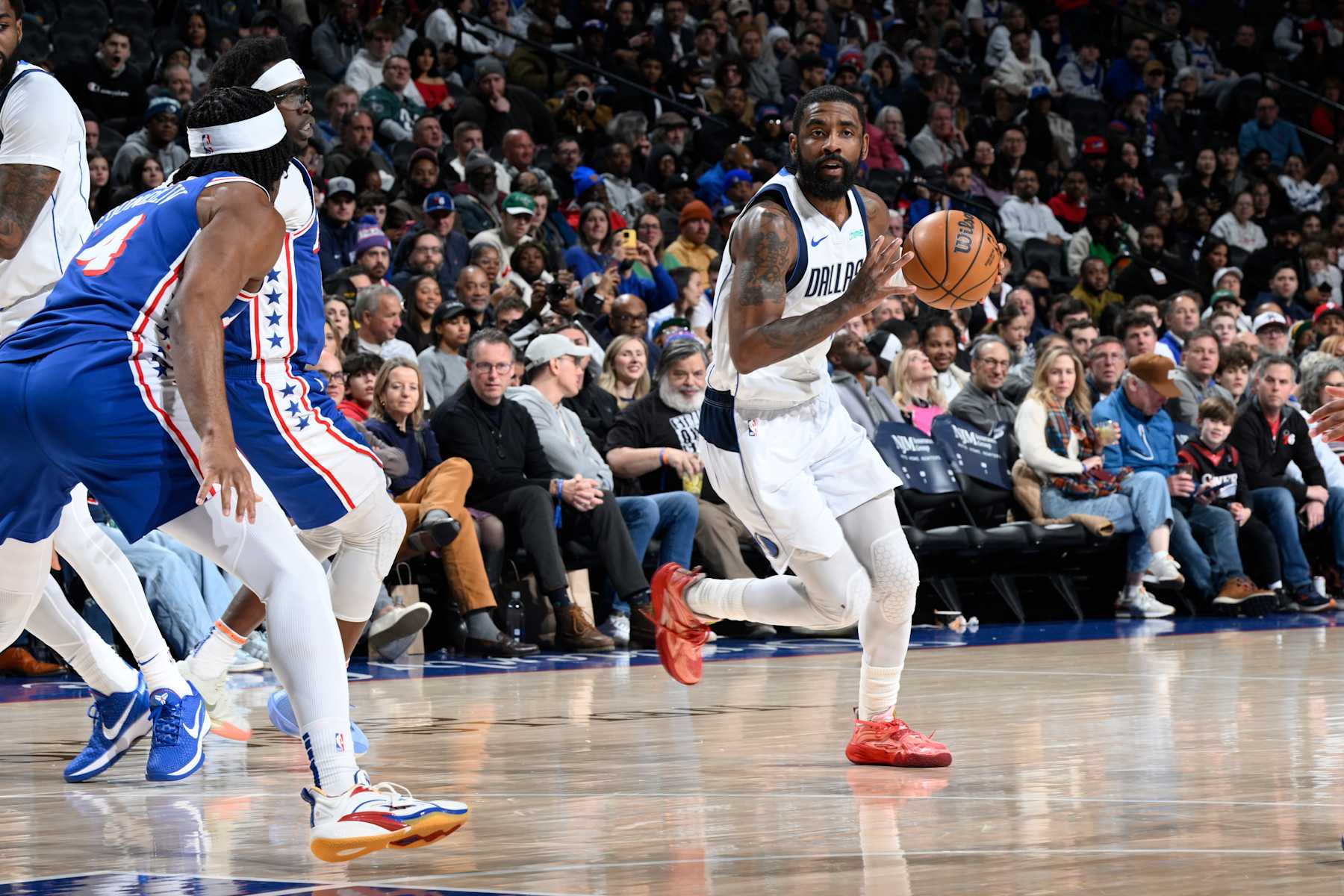 PHILADELPHIA, PA - FEBRUARY 4: Kyrie Irving #11 of the Dallas Mavericks drives to the basket during the game against the Philadelphia 76ers  on February 4, 2025 at the Wells Fargo Center in Philadelphia, Pennsylvania NOTE TO USER: User expressly acknowledges and agrees that, by downloading and/or using this Photograph, user is consenting to the terms and conditions of the Getty Images License Agreement. Mandatory Copyright Notice: Copyright 2025 NBAE (Photo by David Dowt/NBAE via Getty Images)