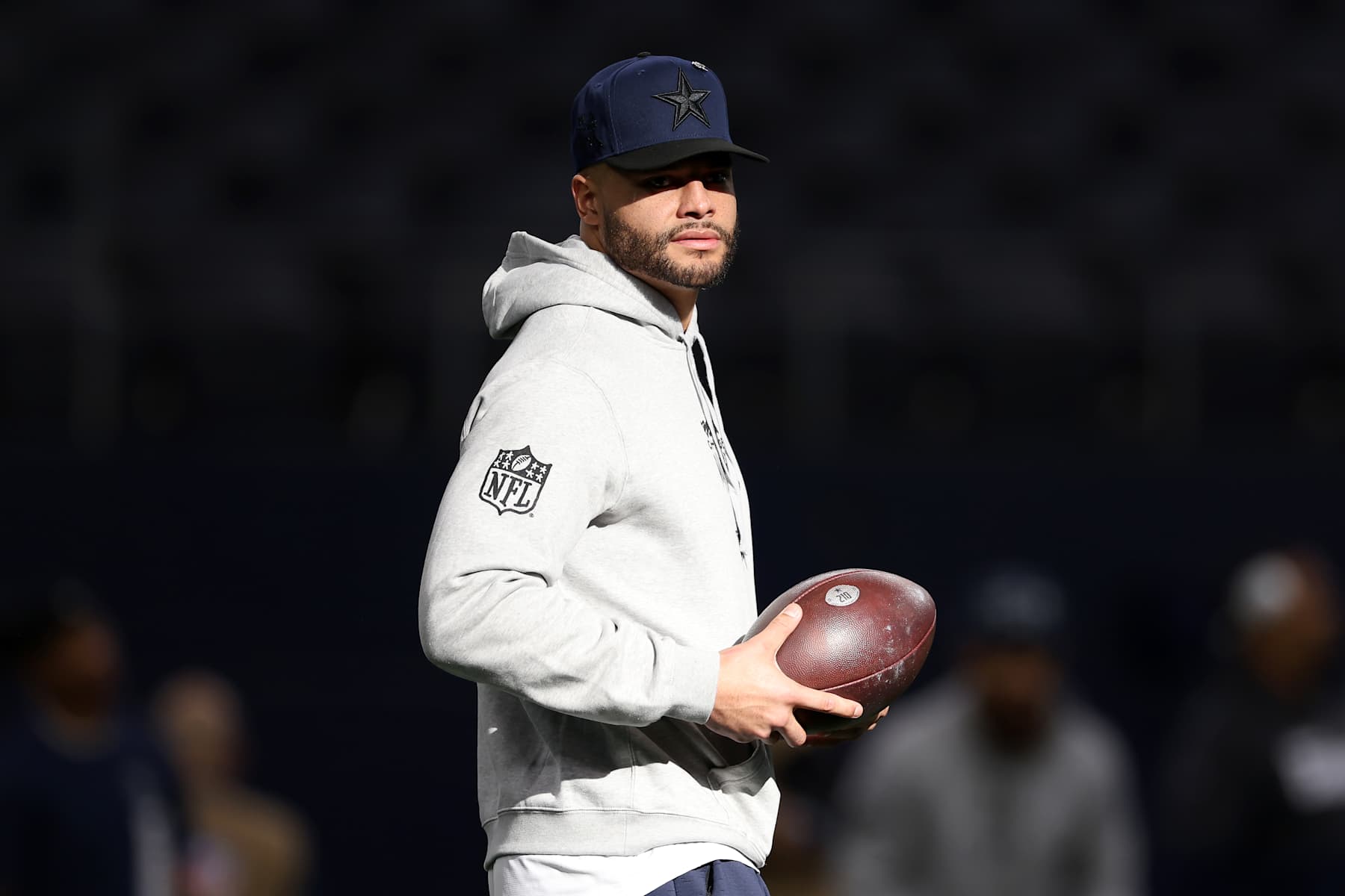 ARLINGTON, TEXAS - JANUARY 05: Dak Prescott #4 of the Dallas Cowboys looks on prior to a game against the Washington Commanders at AT&T Stadium on January 05, 2025 in Arlington, Texas. (Photo by Sam Hodde/Getty Images)