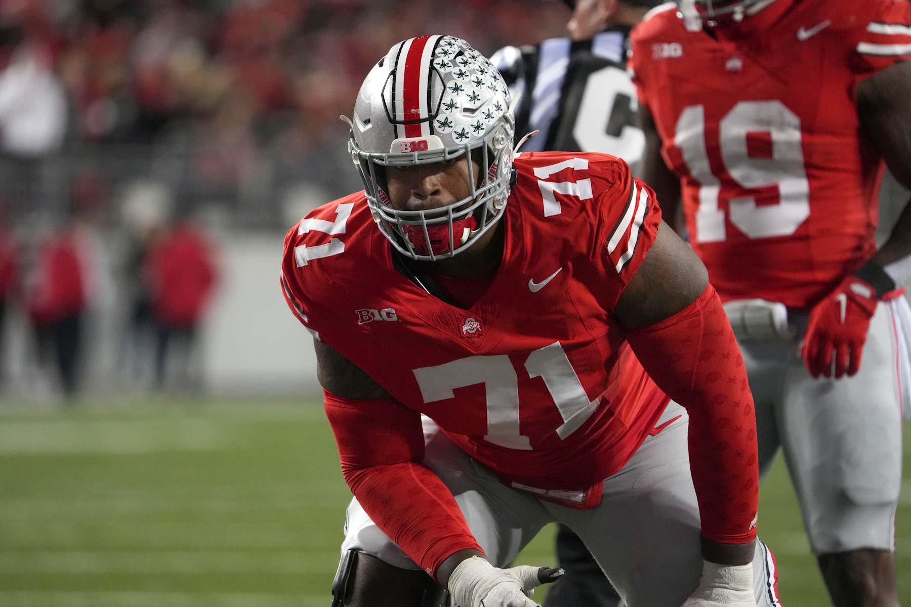 COLUMBUS, OHIO - NOVEMBER 18: Offensive lineman Josh Simmons #71 of the Ohio State Buckeyes lines up during the game against the Minnesota Golden Gophers at Ohio Stadium on November 18, 2023 in Columbus, Ohio. (Photo by Jason Mowry/Getty Images)