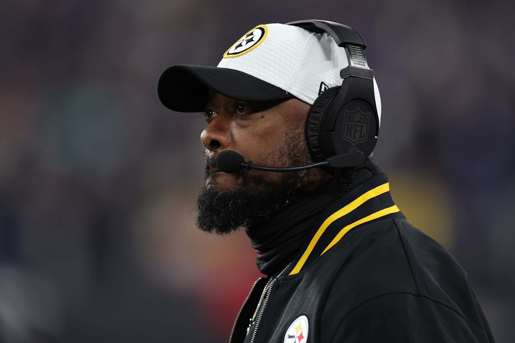 BALTIMORE, MARYLAND - JANUARY 11: Head coach Mike Tomlin looks on during the first quarter against the Baltimore Ravens during the AFC Wild Card Playoff at M&T Bank Stadium on January 11, 2025 in Baltimore, Maryland. (Photo by Scott Taetsch/Getty Images)