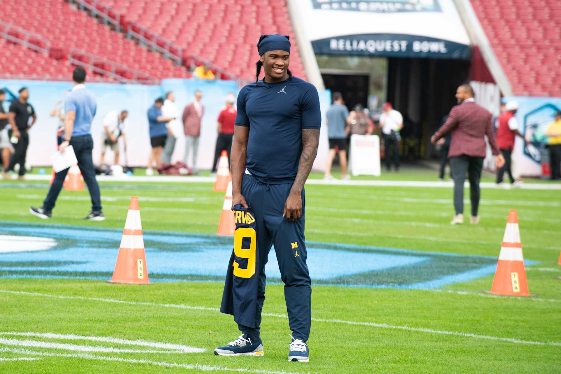 TAMPA, FLORIDA - DECEMBER 31: Bryce Underwood #19 of the Michigan Wolverines is seen on the field before the 2024 ReliaQuest Bowl between the Michigan Wolverines and the Alabama Crimson Tide at Raymond James Stadium on December 31, 2024 in Tampa, Florida. (Photo by Aaron J. Thornton/Getty Images)