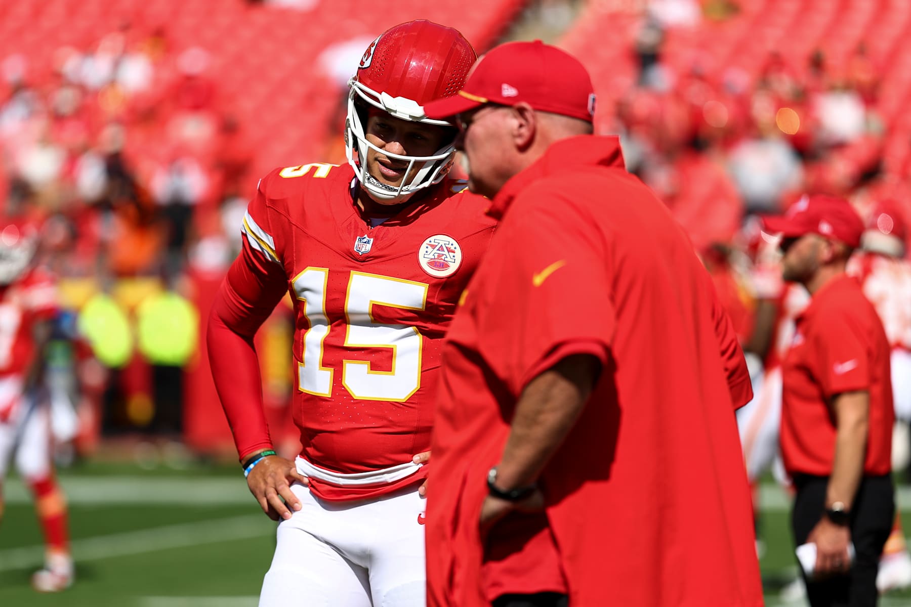 KANSAS CITY, MO - SEPTEMBER 15: Patrick Mahomes #15 of the Kansas City Chiefs talks with head coach Andy Reid prior to an NFL football game against the Cincinnati Bengals at GEHA Field at Arrowhead Stadium on September 15, 2024 in Kansas City, Missouri. (Photo by Kevin Sabitus/Getty Images)