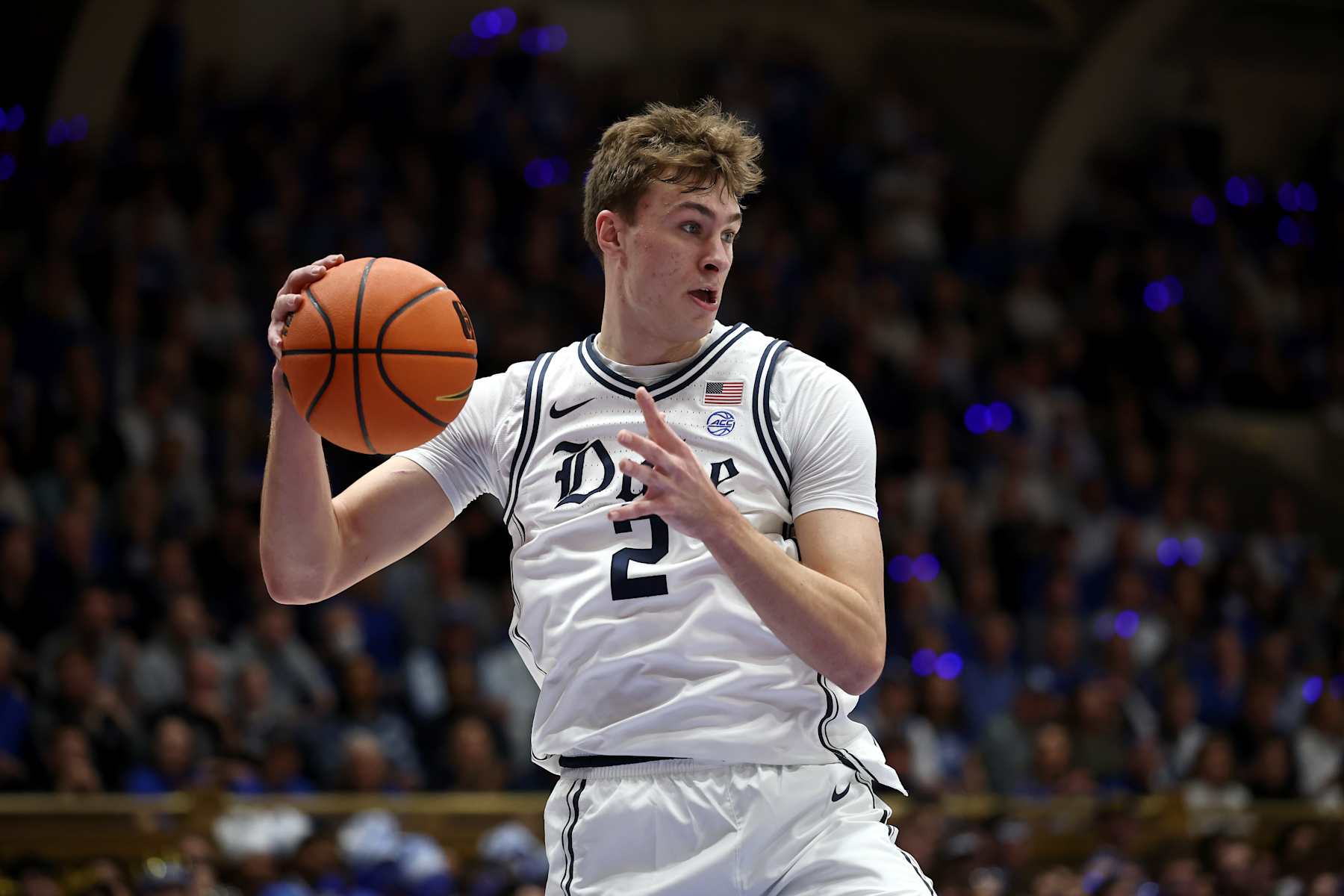 DURHAM, NORTH CAROLINA - FEBRUARY 01: Cooper Flagg #2 of the Duke Blue Devils rebounds the ball during the first half of the game against the North Carolina Tar Heels at Cameron Indoor Stadium on February 01, 2025 in Durham, North Carolina. (Photo by Jared C. Tilton/Getty Images)