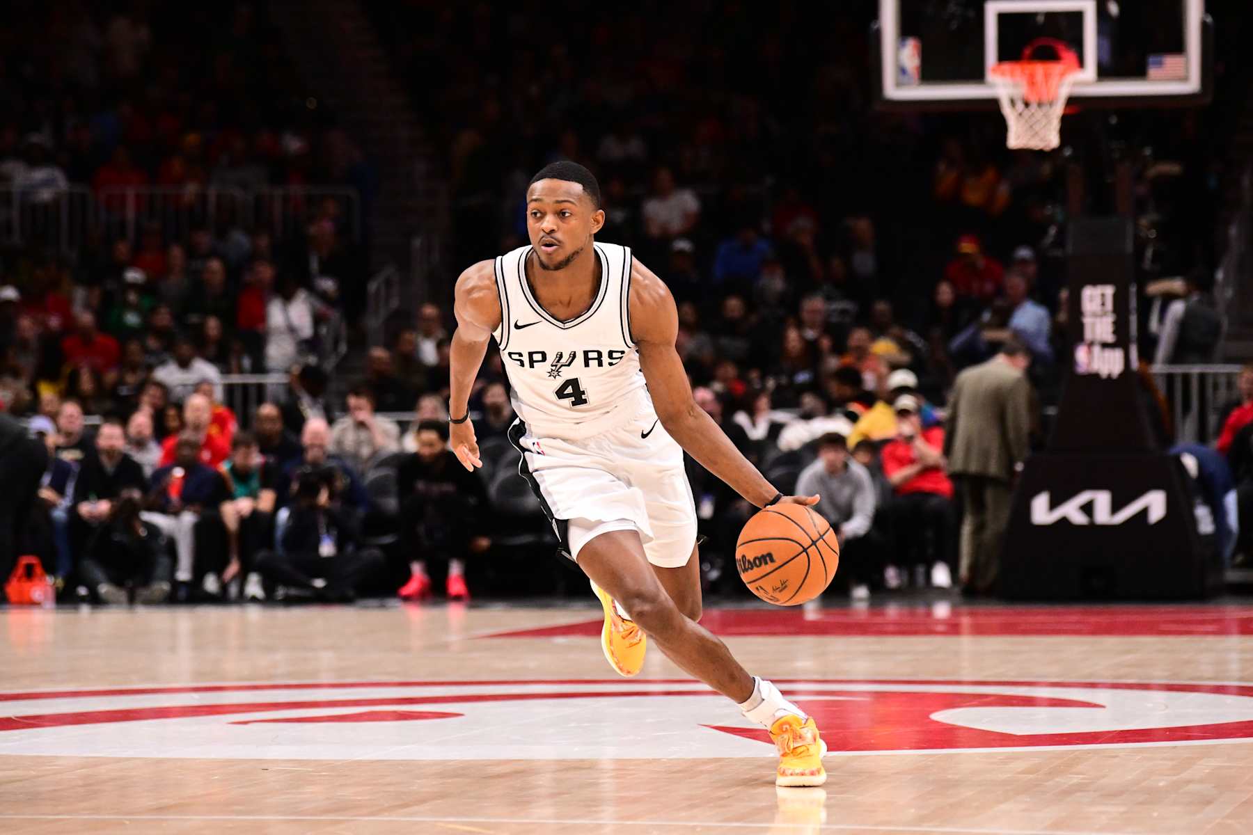 ATLANTA, GA - FEBRUARY 5: De'Aaron Fox #4 of the San Antonio Spurs handles the ball during the game against the Atlanta Hawks on February 5, 2025 at State Farm Arena in Atlanta, Georgia.  NOTE TO USER: User expressly acknowledges and agrees that, by downloading and/or using this Photograph, user is consenting to the terms and conditions of the Getty Images License Agreement. Mandatory Copyright Notice: Copyright 2025 NBAE (Photo by Adam Hagy/NBAE via Getty Images)