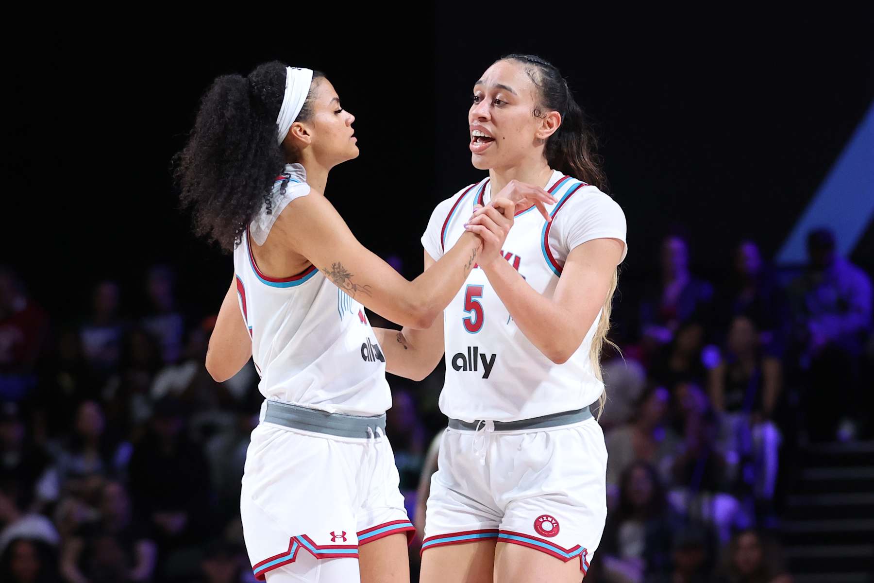 MEDLEY, FLORIDA - FEBRUARY 03: Rae Burrell #12 and Dearica Hamby #5 of the Vinyl reacts during the second quarter against the Lunar Owls at Wayfair Arena on February 03, 2025 in Medley, Florida. (Photo by Megan Briggs/Getty Images)