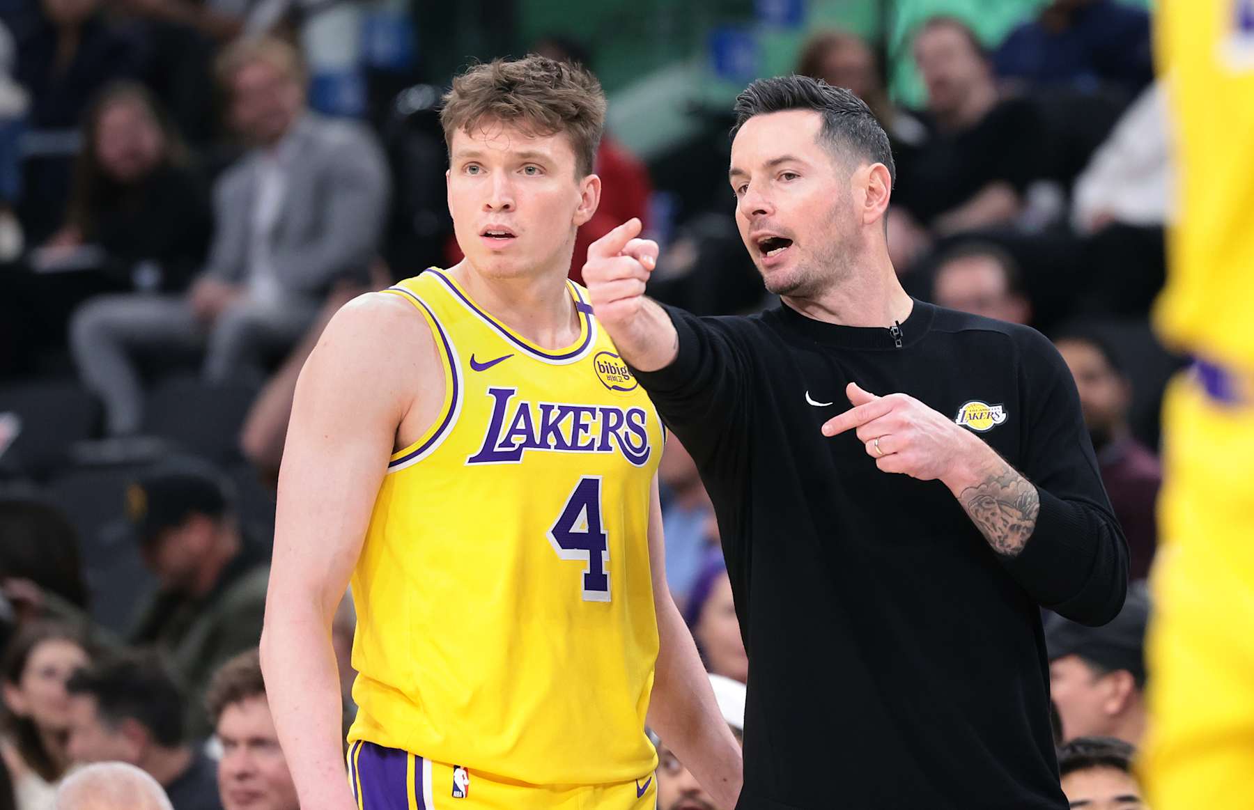 Inglewood, California February 4, 2025-Lakers head coach JJ Redick talks with Dalton Knecht during a game with the Clippers at the Intuit Dome Tuesday. (Wally Skalij/Los Angeles Times via Getty Images)