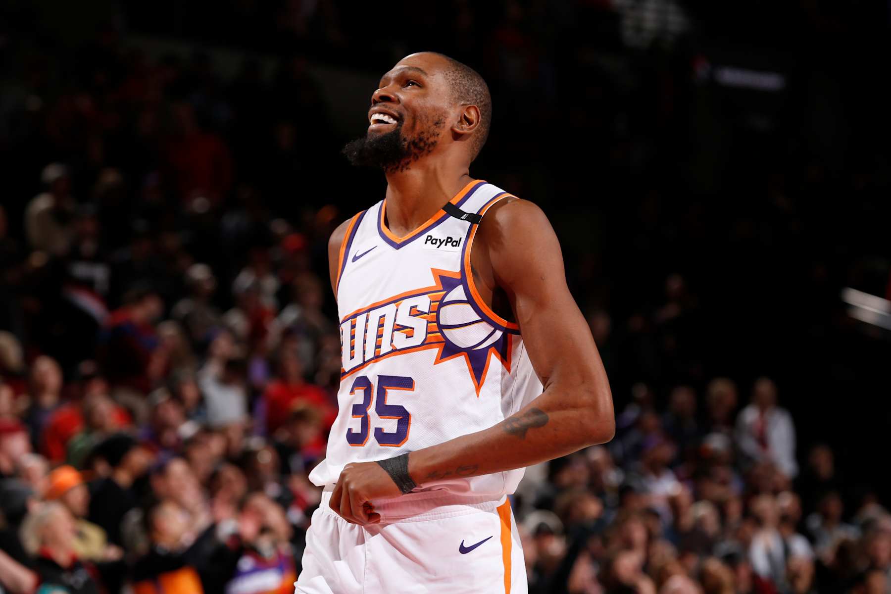 PORTLAND, OR - FEBRUARY 3:  Kevin Durant #35 of the Phoenix Suns smiles during the game against the Portland Trail Blazers on February 3, 2025 at the Moda Center Arena in Portland, Oregon. NOTE TO USER: User expressly acknowledges and agrees that, by downloading and or using this photograph, user is consenting to the terms and conditions of the Getty Images License Agreement. Mandatory Copyright Notice: Copyright 2025 NBAE (Photo by Cameron Browne/NBAE via Getty Images)