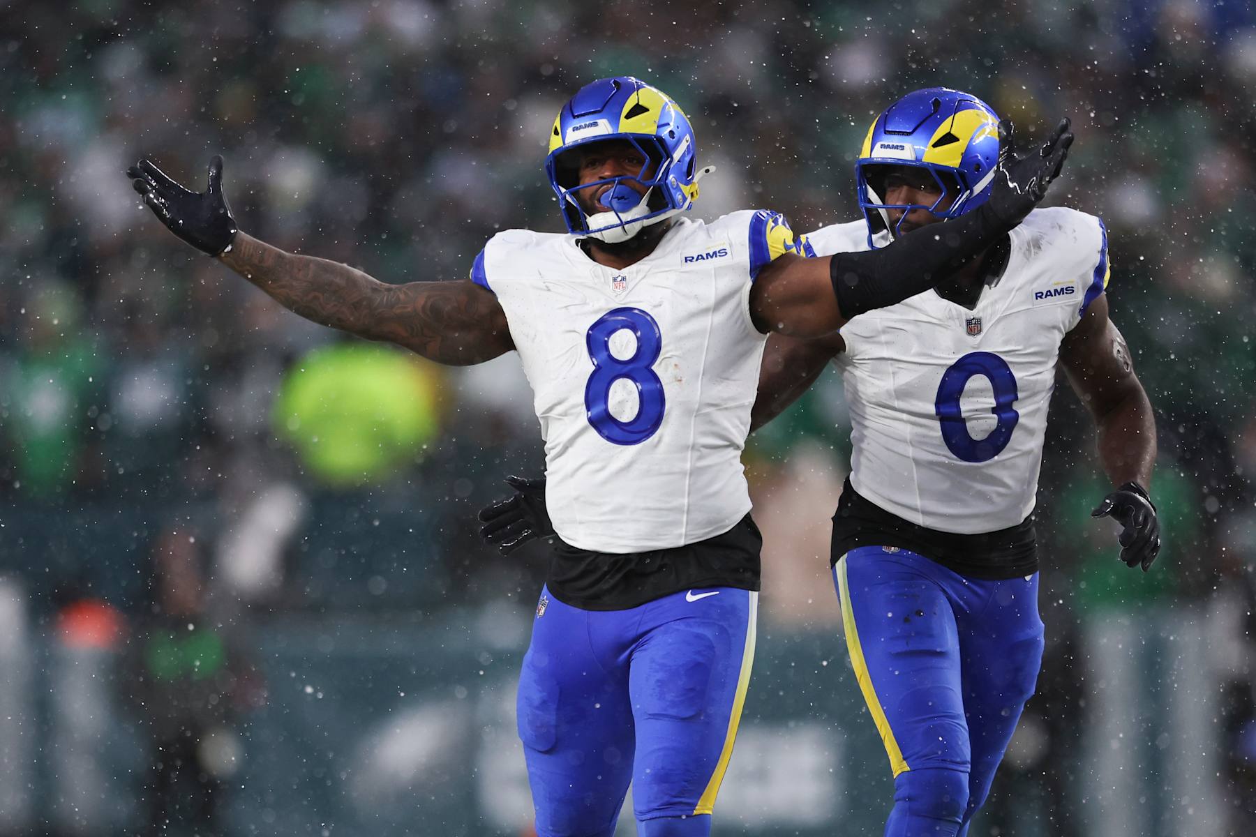 PHILADELPHIA, PENNSYLVANIA - JANUARY 19: Jared Verse #8 and Byron Young #0 of the Los Angeles Rams celebrate after a play during the NFC Divisional playoff game against the Philadelphia Eagles at Lincoln Financial Field on January 19, 2025 in Philadelphia, Pennsylvania. The Eagles defeated the Rams 28-22. (Kara Durrette/Getty Images)