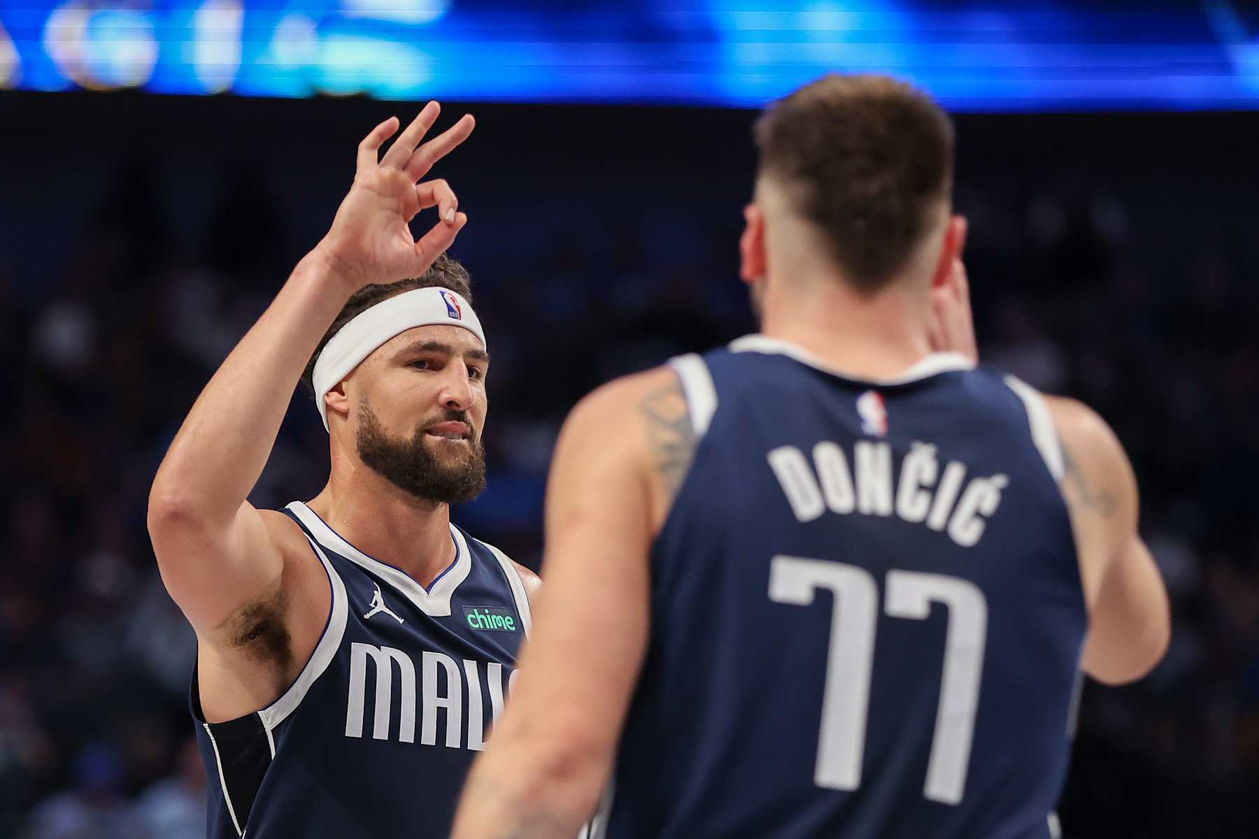 DALLAS, TEXAS - OCTOBER 24: Klay Thompson #31 of the Dallas Mavericks congratulates Luka Doncic #77 on his three-point basket against the San Antonio Spurs during the third quarter at American Airlines Center on October 24, 2024 in Dallas, Texas. NOTE TO USER: User expressly acknowledges and agrees that, by downloading and or using this photograph, User is consenting to the terms and conditions of the Getty Images License Agreement. (Photo by Sam Hodde/Getty Images)