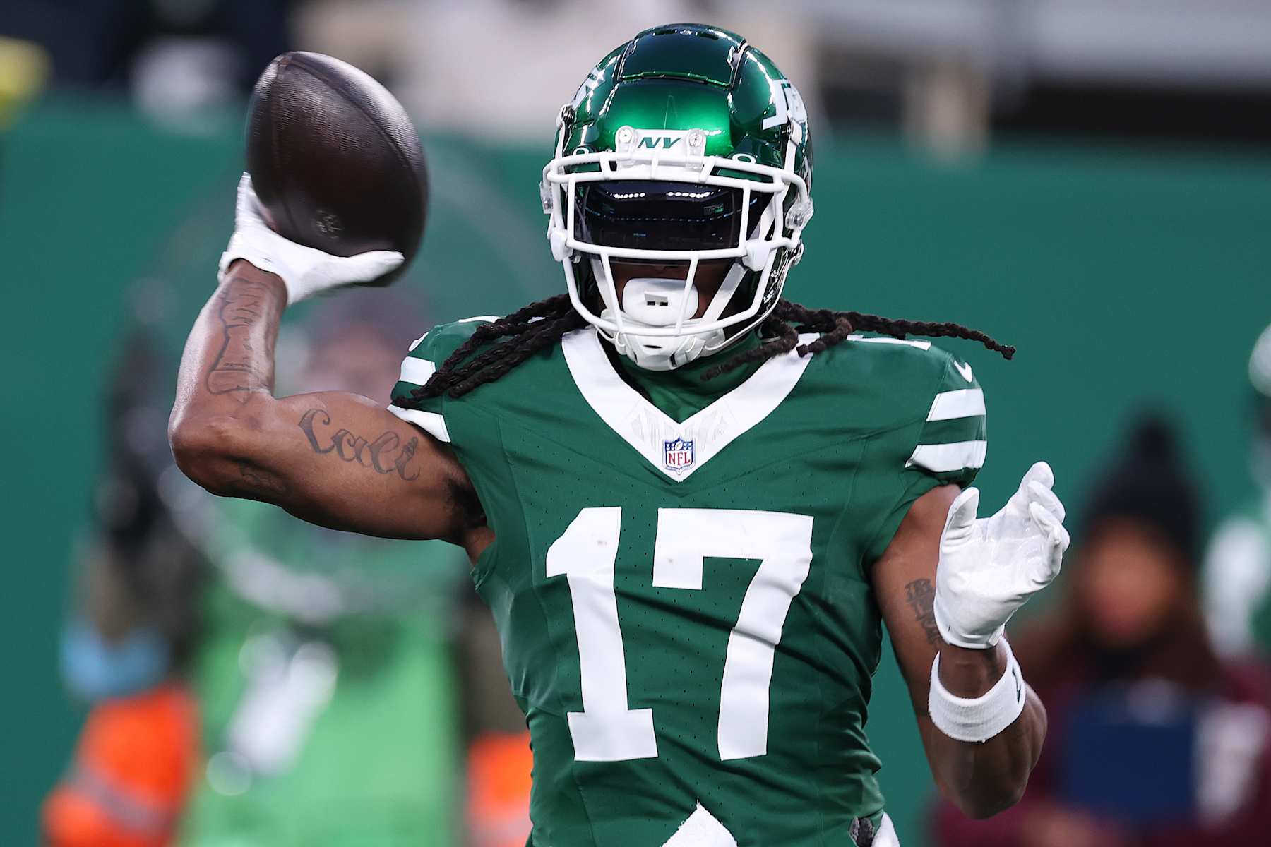 EAST RUTHERFORD, NEW JERSEY - JANUARY 05: Davante Adams #17 of the New York Jets throws the ball against the Miami Dolphins during the first quarter at MetLife Stadium on January 05, 2025 in East Rutherford, New Jersey. (Photo by Al Bello/Getty Images)