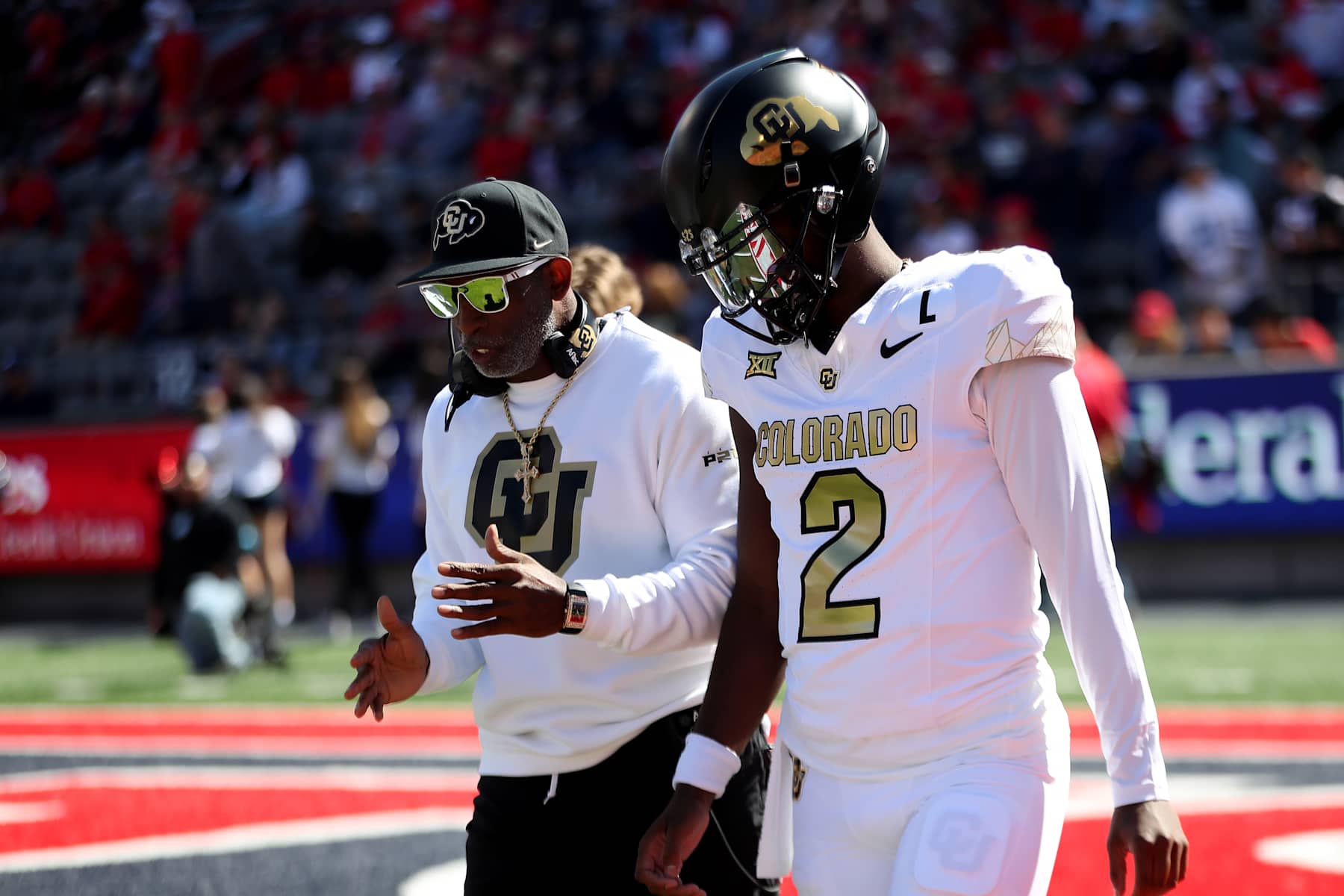 TUCSON, AZ - OCTOBER 19: Colorado Buffaloes head coach Deion Sanders and Colorado Buffaloes quarterback Shedeur Sanders #2 prior to a football game between the University of Colorado Buffaloes and the University of Arizona Wildcats.  October 19, 2024 at Arizona Stadium in Tucson, AZ. (Photo by Christopher Hook/Icon Sportswire via Getty Images)