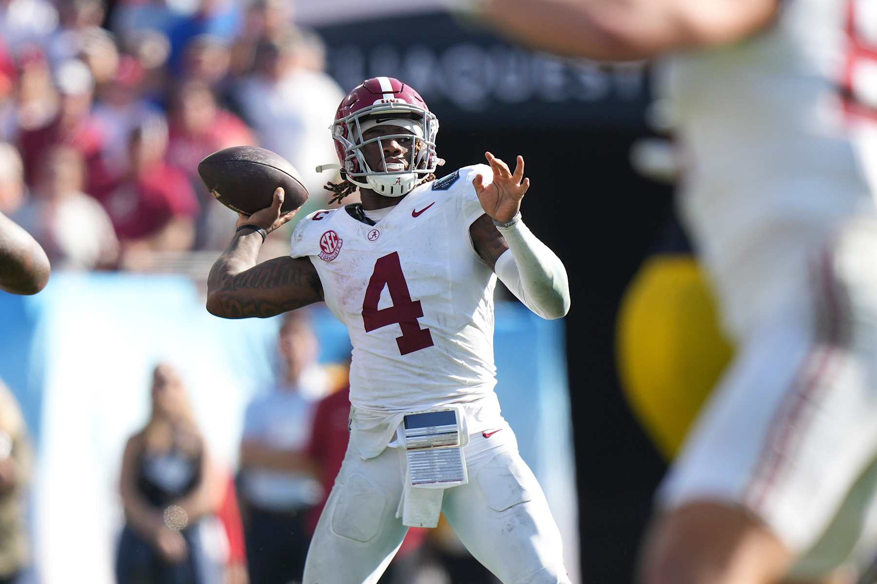TAMPA, FL - DECEMBER 31: Alabama Crimson Tide quarterback Jalen Milroe (4) makes a pass attempt during the ReliaQuest Bowl game between the Michigan Wolverines and the Alabama Crimson Tide on Tuesday, December 31, 2024 at Raymond James Stadium in Tampa, Fla. (Photo by Peter Joneleit/Icon Sportswire via Getty Images)