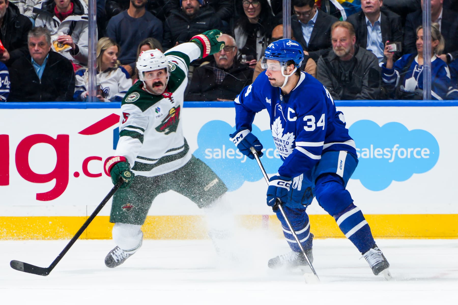 TORONTO, ON - JANUARY 29: Auston Matthews #34 of the Toronto Maple Leafs plays the puck during the second period against the Minnesota Wild at the Scotiabank Arena on January 29, 2025 in Toronto, Ontario, Canada. (Photo by Thomas Skrlj/NHLI via Getty Images)