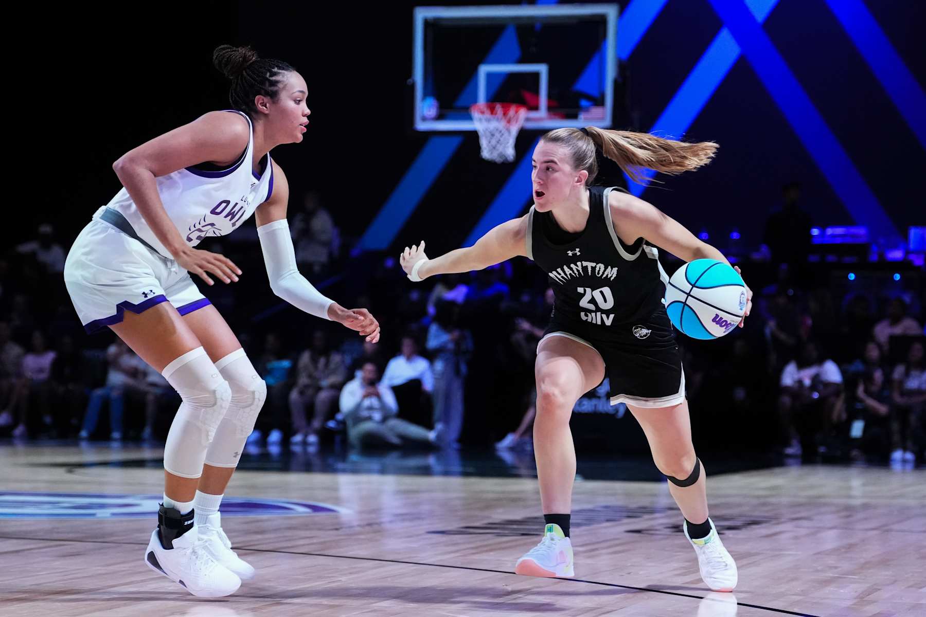 MEDLEY, FLORIDA - FEBRUARY 07: Sabrina Ionescu #20 of Phantom drives to the basket against Napheesa Collier #24 of the Lunar Owls during the fourth quarter at Wayfair Arena on February 07, 2025 in Medley, Florida. (Photo by Rich Storry/Getty Images)