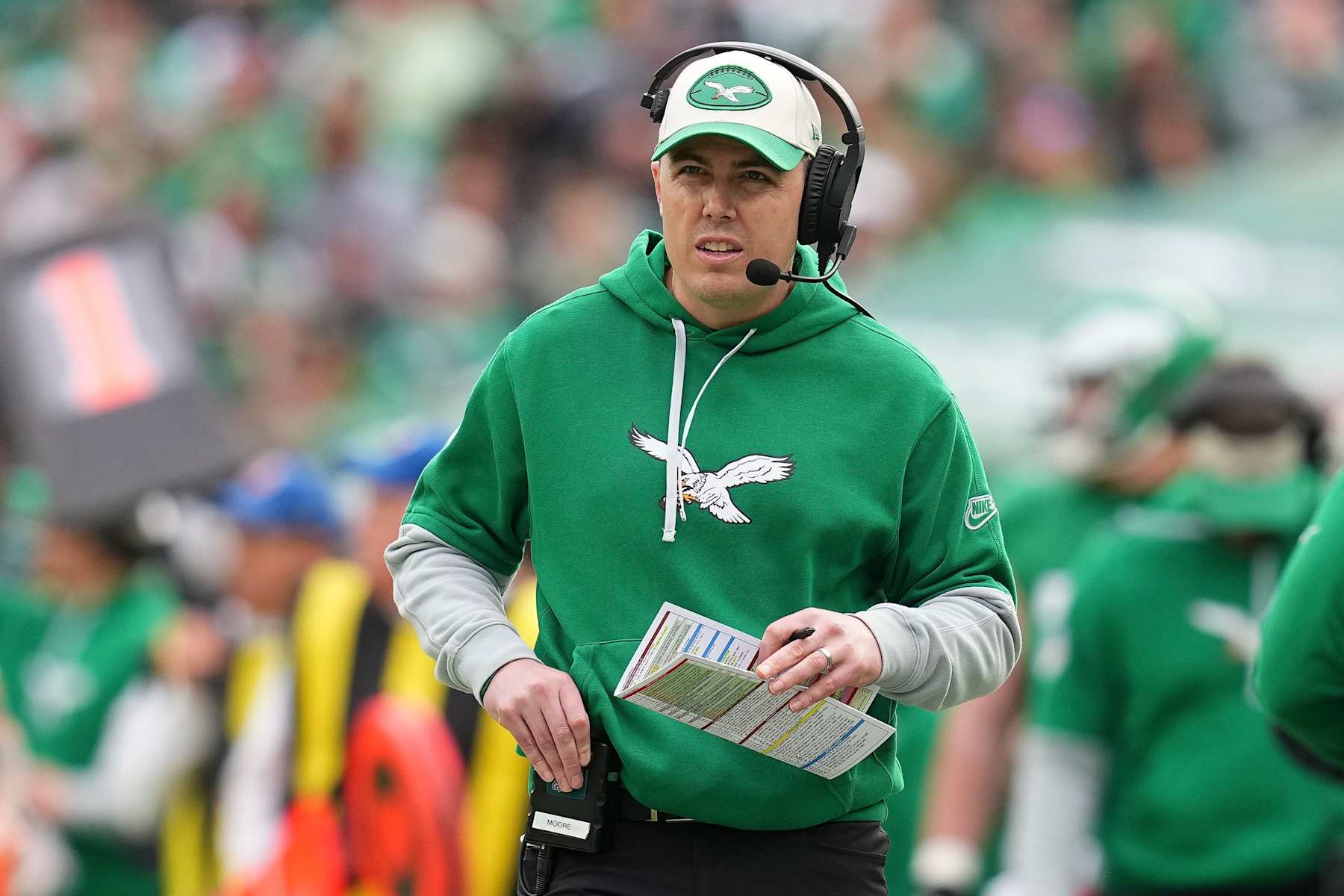PHILADELPHIA, PENNSYLVANIA - DECEMBER 29: Offensive coordinator Kellen Moore of the Philadelphia Eagles looks on against the Dallas Cowboys at Lincoln Financial Field on December 29, 2024 in Philadelphia, Pennsylvania. (Photo by Mitchell Leff/Getty Images)
