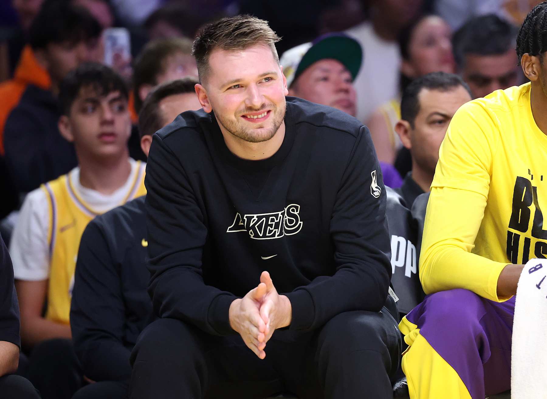 Los Angeles, California February 6, 2025-Lakers Luka Doncic watches the game from the bench during a game with the Warriors at Crypto.com Arena Thursday. (Wally Skalij/Los Angeles Times via Getty Images)