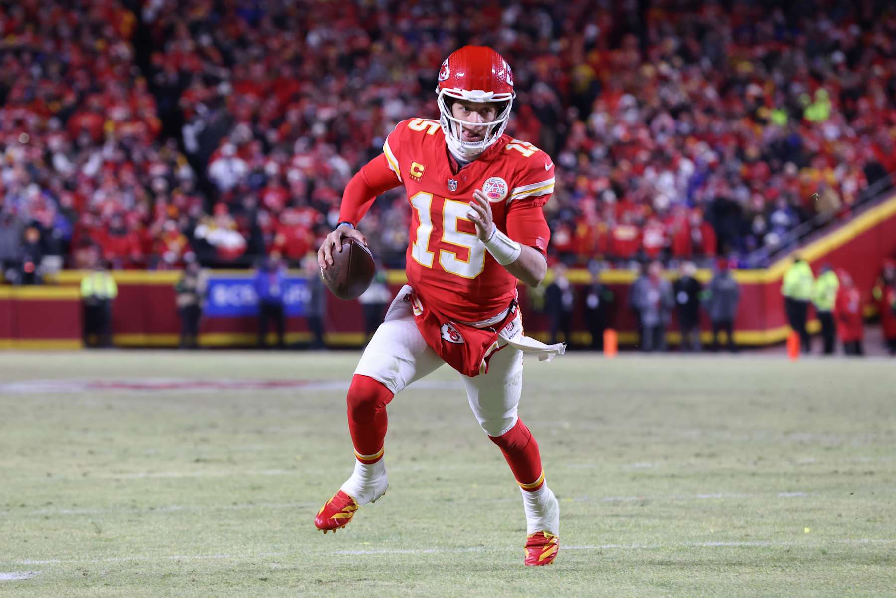 KANSAS CITY, MO - JANUARY 26: Kansas City Chiefs quarterback Patrick Mahomes (15) during a 1-yard touchdown run in the second quarter of the AFC Championship game between the Buffalo Bills and Kansas City Chiefs on January 26, 2025 at GEHA Field at Arrowhead Stadium in Kansas City, MO. (Photo by Scott Winters/Icon Sportswire via Getty Images)