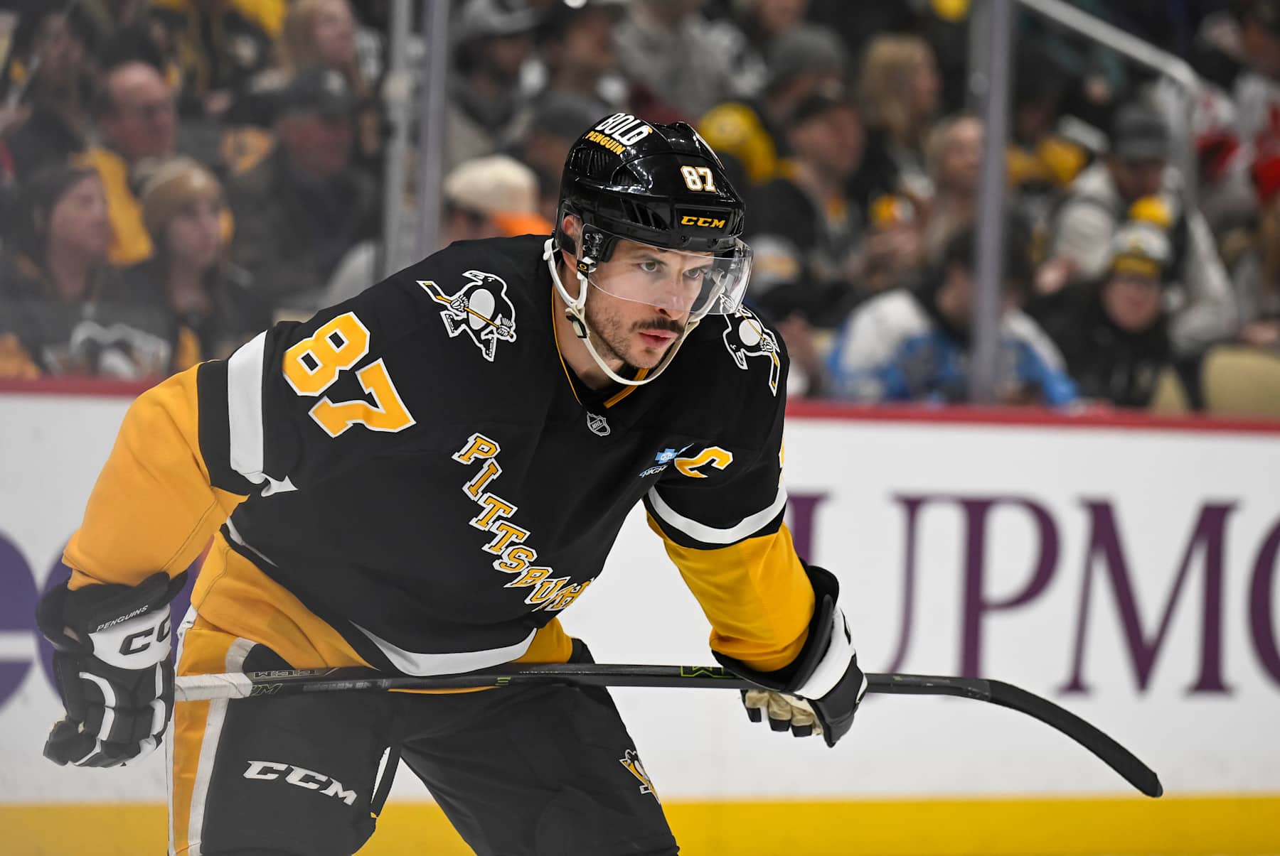 PITTSBURGH, PA - FEBRUARY 04: Pittsburgh Penguins center Sidney Crosby (87) looks on during the first period in the NHL game between the Pittsburgh Penguins and the New Jersey Devils on February 4, 2025, at PPG Paints Arena in Pittsburgh, PA. (Photo by Jeanine Leech/Icon Sportswire via Getty Images)