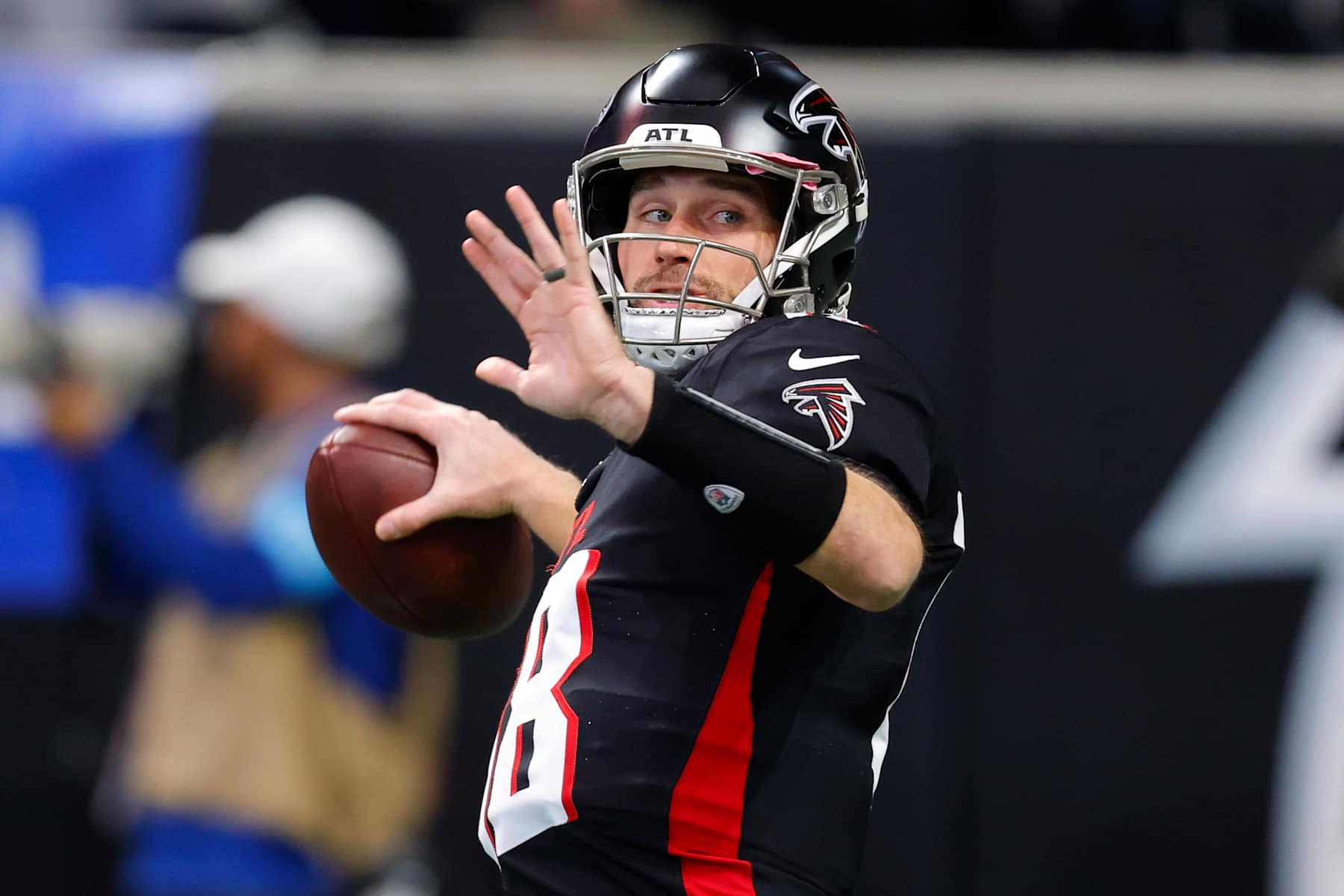 ATLANTA, GEORGIA - JANUARY 5: Kirk Cousins #18 of the Atlanta Falcons warms up prior to the game against the Carolina Panthers at Mercedes-Benz Stadium on January 5, 2025 in Atlanta, Georgia. (Photo by Todd Kirkland/Getty Images)