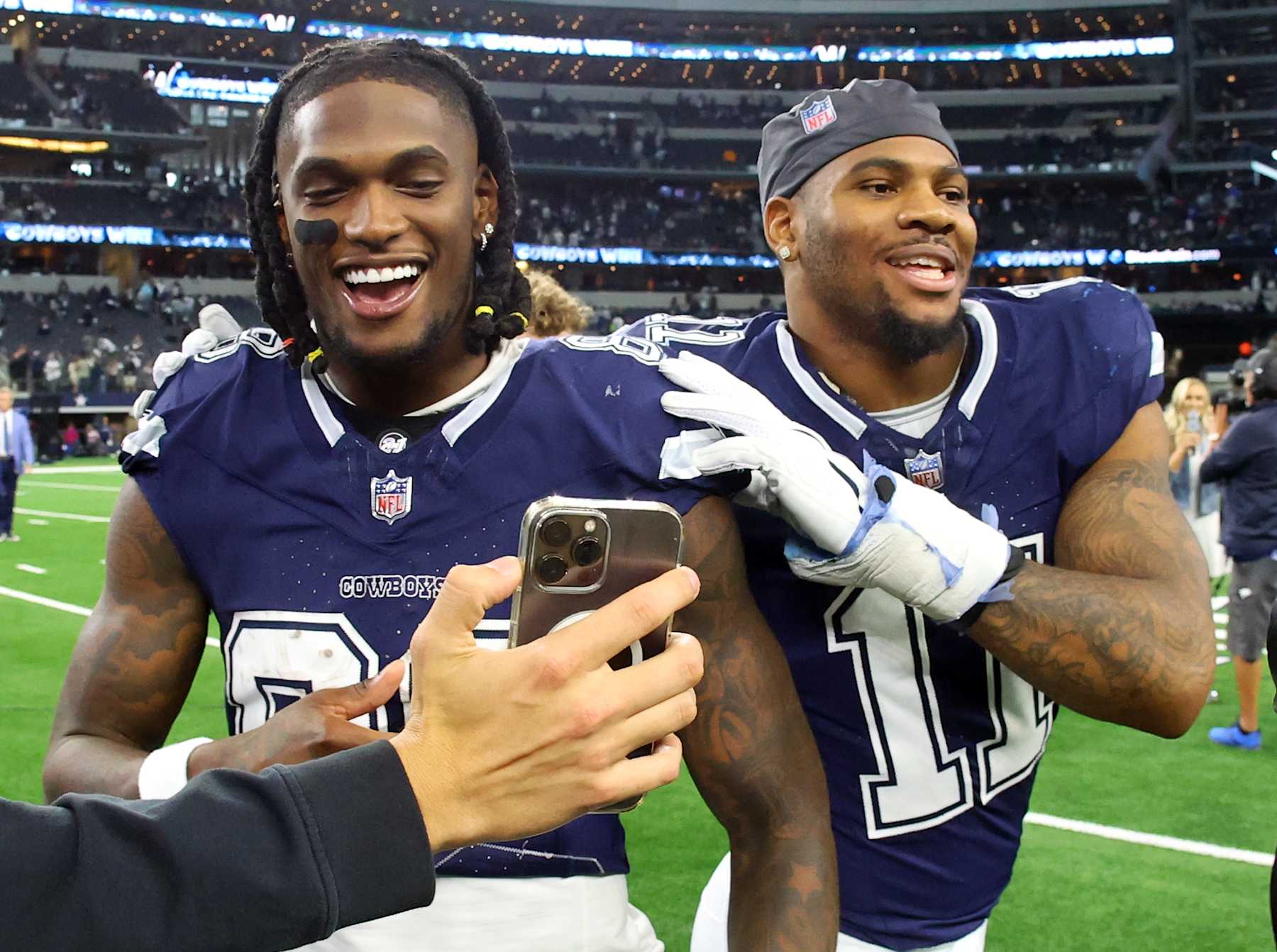 ARLINGTON, TEXAS - OCTOBER 29: CeeDee Lamb #88 and Micah Parsons #11 of the Dallas Cowboys celebrate after the win over the Los Angeles Rams at AT&T Stadium on October 29, 2023 in Arlington, Texas. (Photo by Richard Rodriguez/Getty Images)