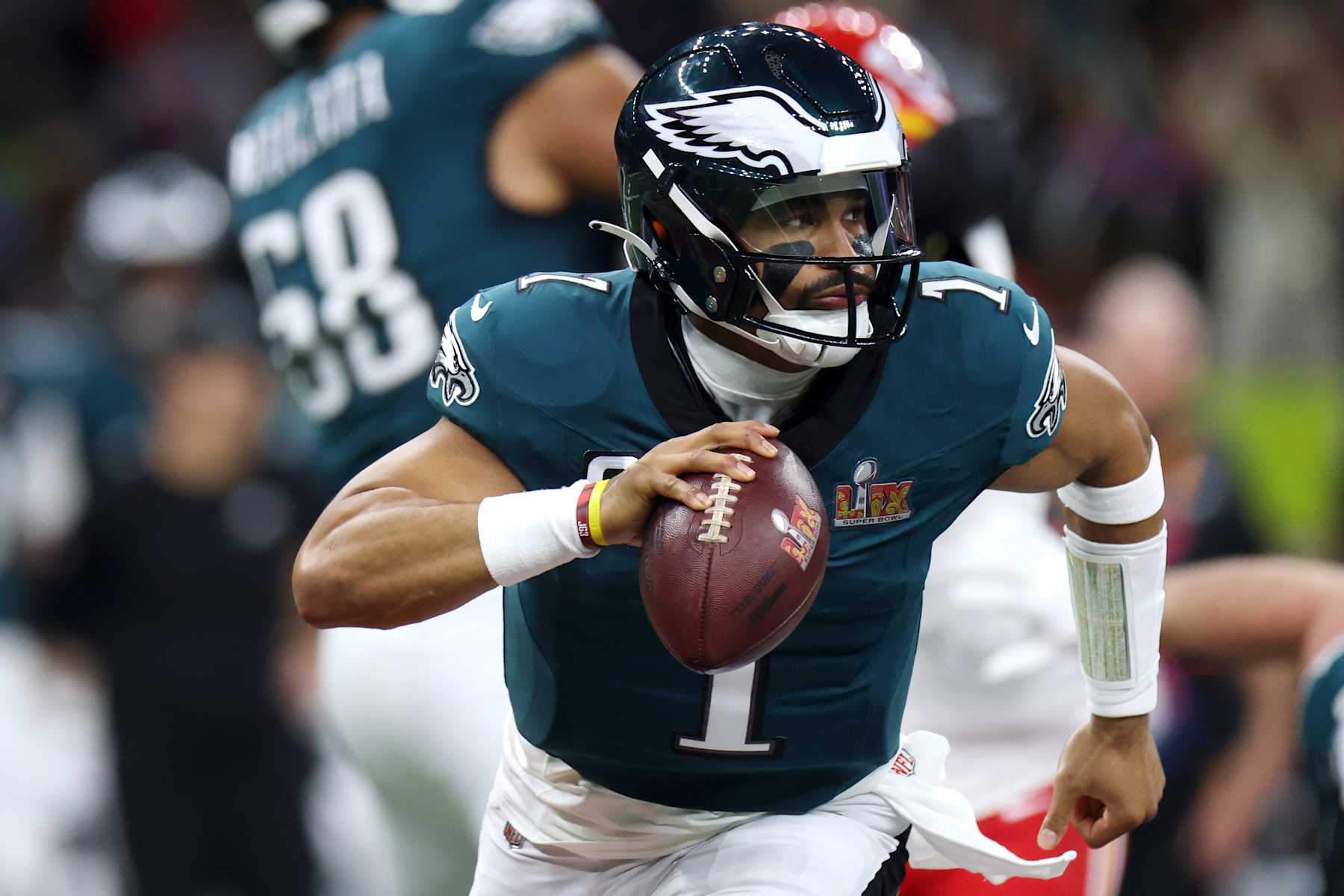 NEW ORLEANS, LOUISIANA - FEBRUARY 09: Jalen Hurts #1 of the Philadelphia Eagles scrambles in the first quarter against the Kansas City Chiefs during Super Bowl LIX at Caesars Superdome on February 09, 2025 in New Orleans, Louisiana. (Photo by Jamie Squire/Getty Images)