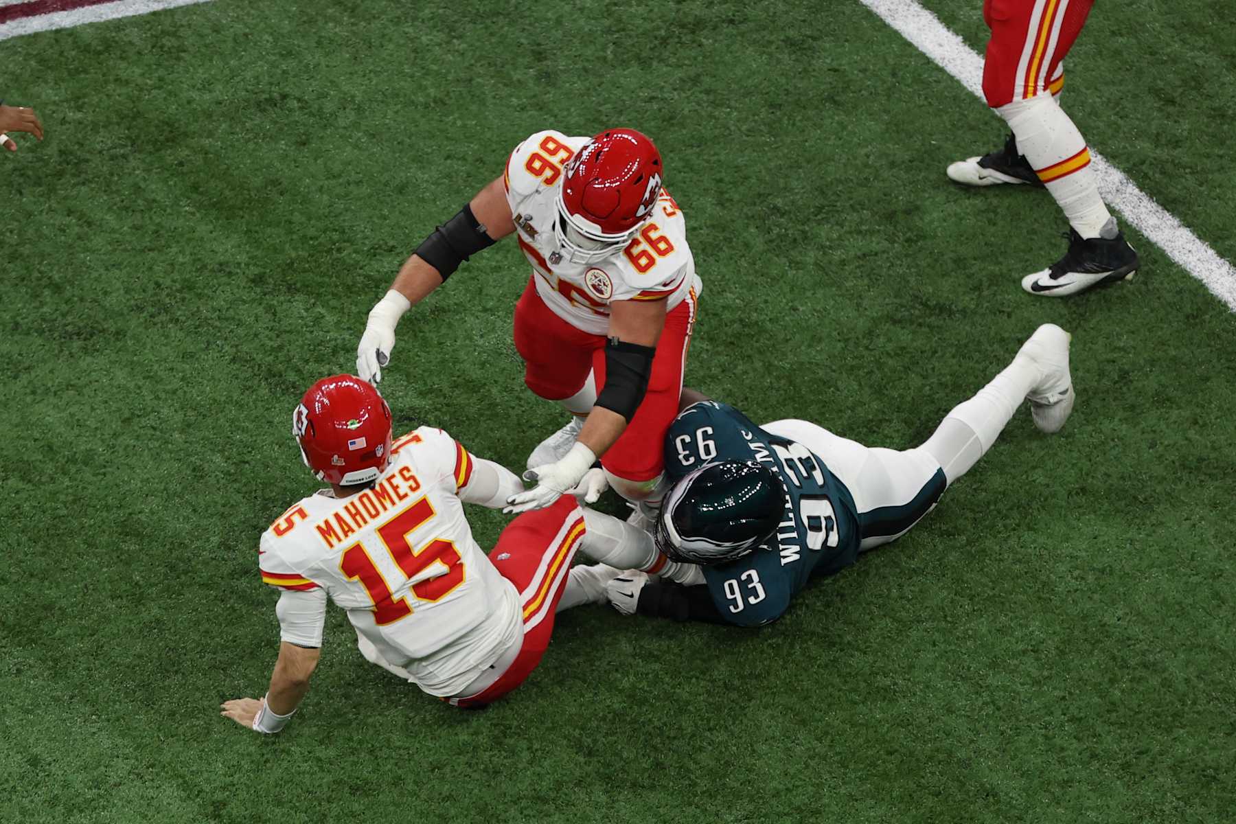 NEW ORLEANS, LA - FEBRUARY 09: QB Patrick Mahomes #15 of the Kansas City Chiefs is sacked by DT Milton Williams #93 of the Philadelphia Eagles in the second quarter during Super Bowl LIX between the Philadelphia Eagles and the Kansas City Chiefs on February 09, 2025, at the Caesars Superdome in New Orleans, LA.  (Photo by David Buono/Icon Sportswire via Getty Images)