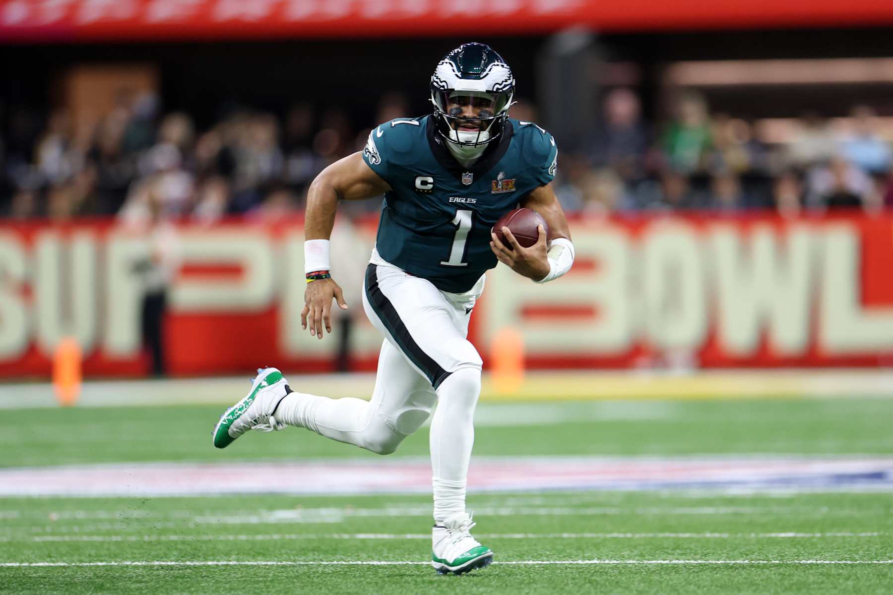 NEW ORLEANS, LOUISIANA - FEBRUARY 09: Jalen Hurts #1 of the Philadelphia Eagles scrambles in the second quarter against the Kansas City Chiefs during Super Bowl LIX at Caesars Superdome on February 09, 2025 in New Orleans, Louisiana. (Photo by Jamie Squire/Getty Images)