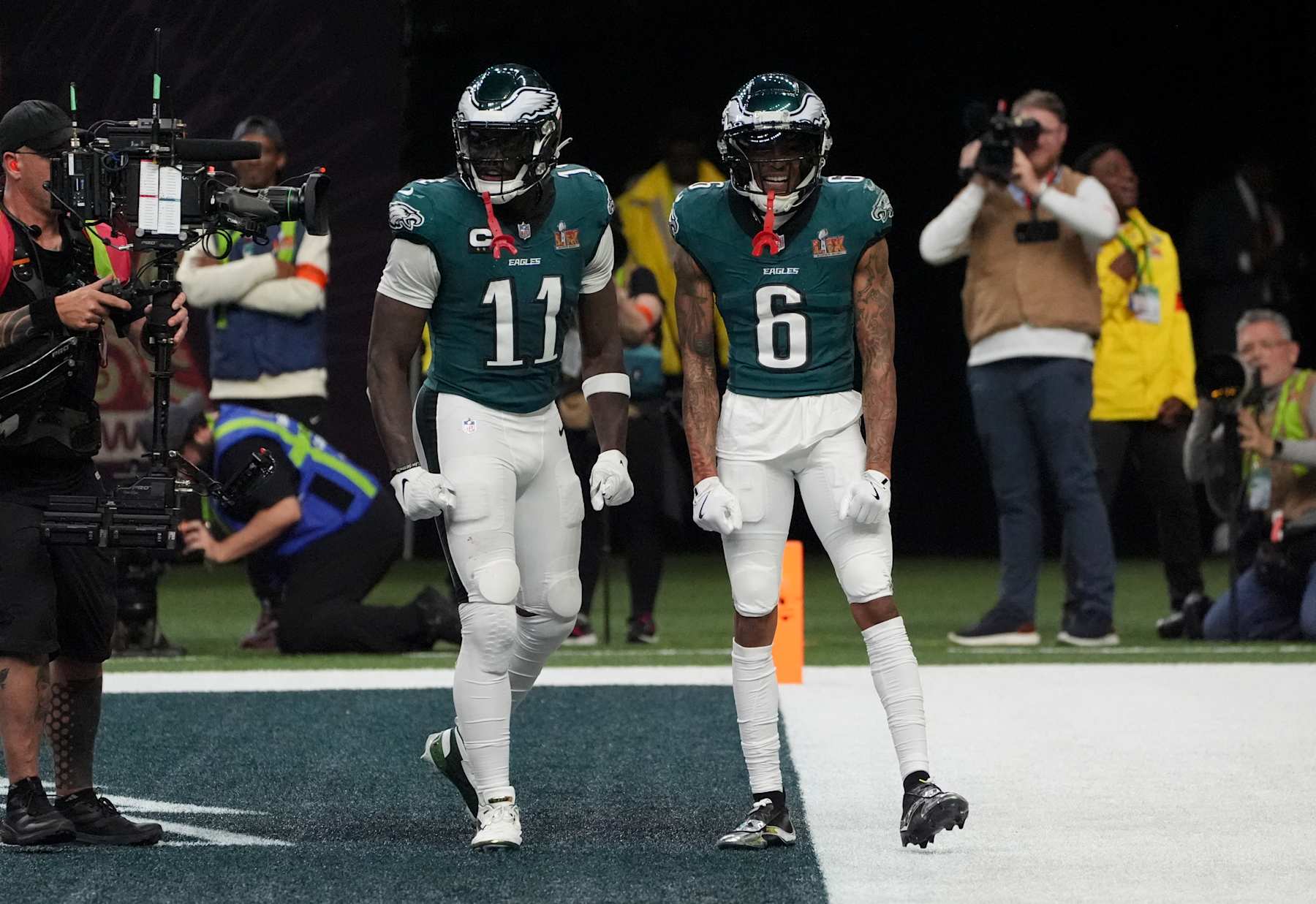 Philadelphia Eagles' wide receiver #06 DeVonta Smith celebrates his touchdown with teammate Philadelphia Eagles' wide receiver #11 A.J. Brown during Super Bowl LIX between the Kansas City Chiefs and the Philadelphia Eagles at Caesars Superdome in New Orleans, Louisiana, February 9, 2025. (Photo by TIMOTHY A. CLARY / AFP) (Photo by TIMOTHY A. CLARY/AFP via Getty Images)          