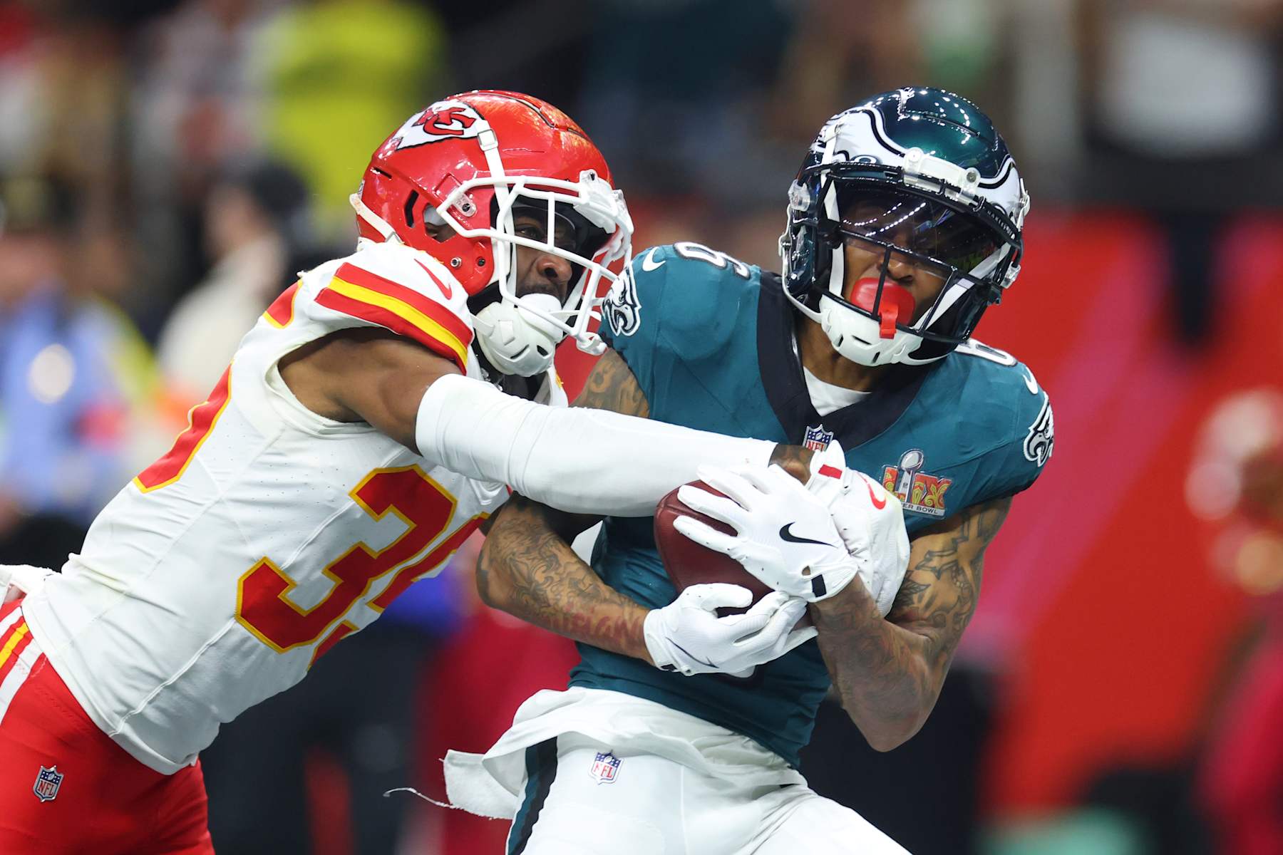 NEW ORLEANS, LOUISIANA - FEBRUARY 09: DeVonta Smith #6 of the Philadelphia Eagles makes a catch for a touchdown past Jaylen Watson #35 of the Kansas City Chiefs in the third quarter during Super Bowl LIX at Caesars Superdome on February 09, 2025 in New Orleans, Louisiana. (Photo by Gregory Shamus/Getty Images)
