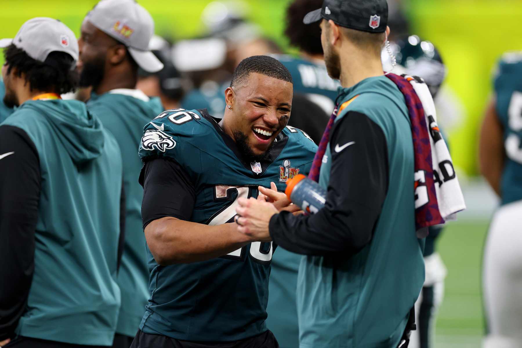 NEW ORLEANS, LOUISIANA - FEBRUARY 09: Saquon Barkley #26 of the Philadelphia Eagles celebrates with teammates on the sideline in the fourth quarter against the Kansas City Chiefs during Super Bowl LIX at Caesars Superdome on February 09, 2025 in New Orleans, Louisiana. (Photo by Gregory Shamus/Getty Images)