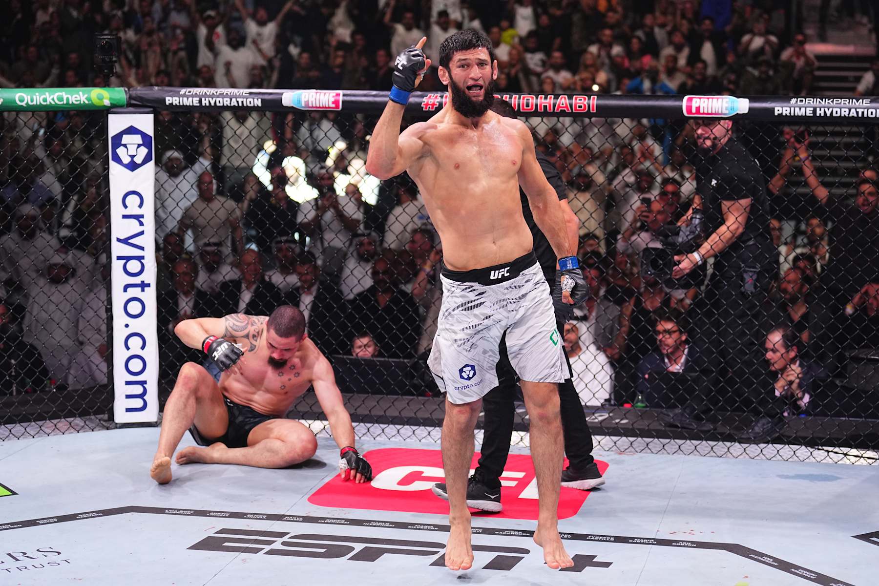 Khamzat Chimaev reacts after a submission victory against Robert Whittaker