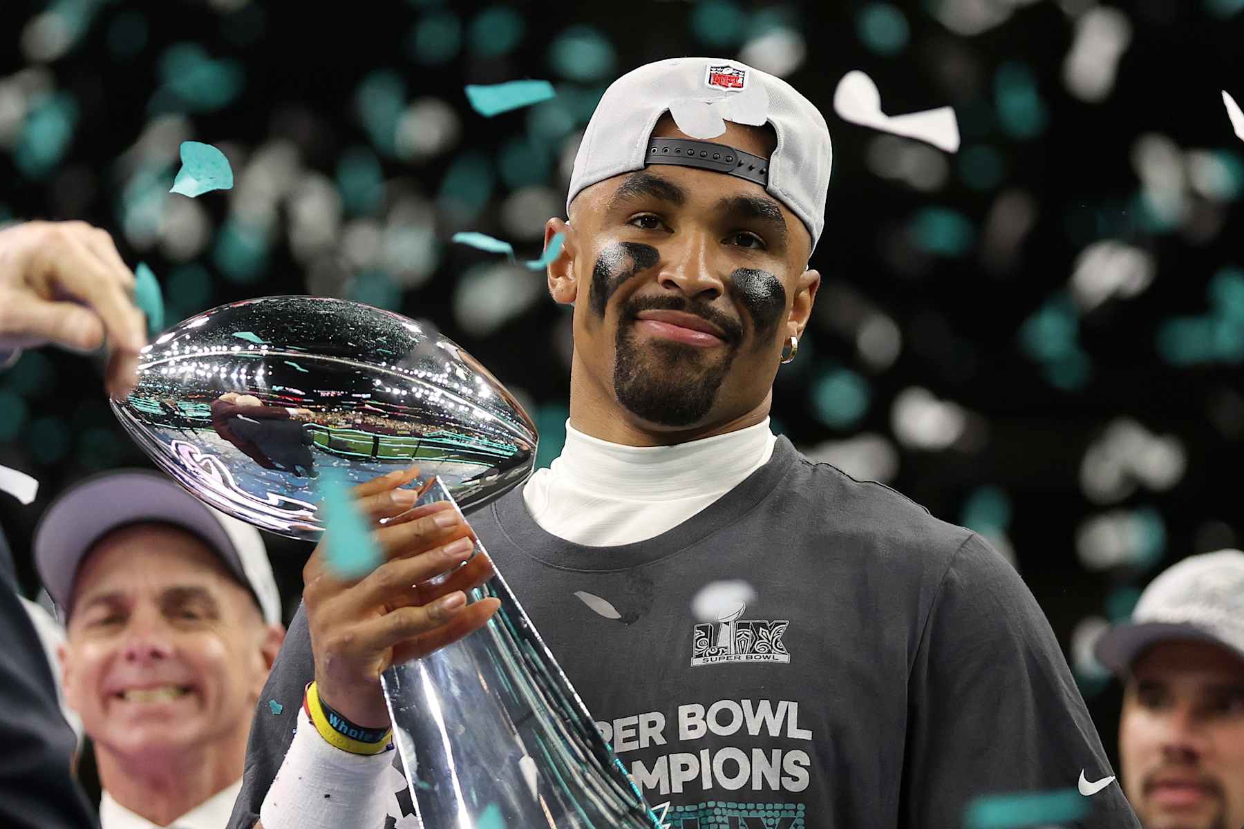 NEW ORLEANS, LOUISIANA - FEBRUARY 09: Jalen Hurts #1 of the Philadelphia Eagles celebrates with the Vince Lombardi Trophy after defeating the Kansas City Chiefs 40-22 to win Super Bowl LIX at Caesars Superdome on February 09, 2025 in New Orleans, Louisiana. (Photo by Jamie Squire/Getty Images)