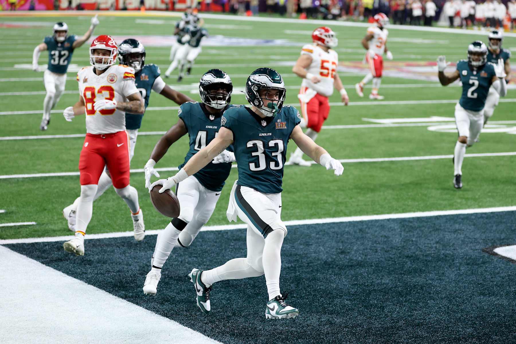 NEW ORLEANS, LOUISIANA - FEBRUARY 09: Cooper DeJean #33 of the Philadelphia Eagles celebrates scoring a touchdown after making an interception in the second quarter against the Kansas City Chiefs during Super Bowl LIX at Caesars Superdome on February 09, 2025 in New Orleans, Louisiana. (Photo by Emilee Chinn/Getty Images)