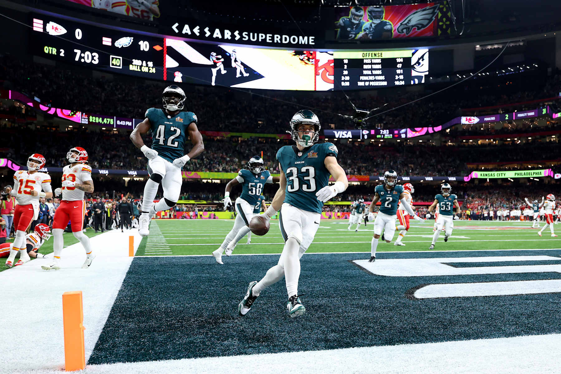 NEW ORLEANS, LOUISIANA - FEBRUARY 09: Cooper DeJean #33 of the Philadelphia Eagles celebrates scoring a touchdown after making an interception in the second quarter against the Kansas City Chiefs during Super Bowl LIX at Caesars Superdome on February 09, 2025 in New Orleans, Louisiana. (Photo by Gregory Shamus/Getty Images)