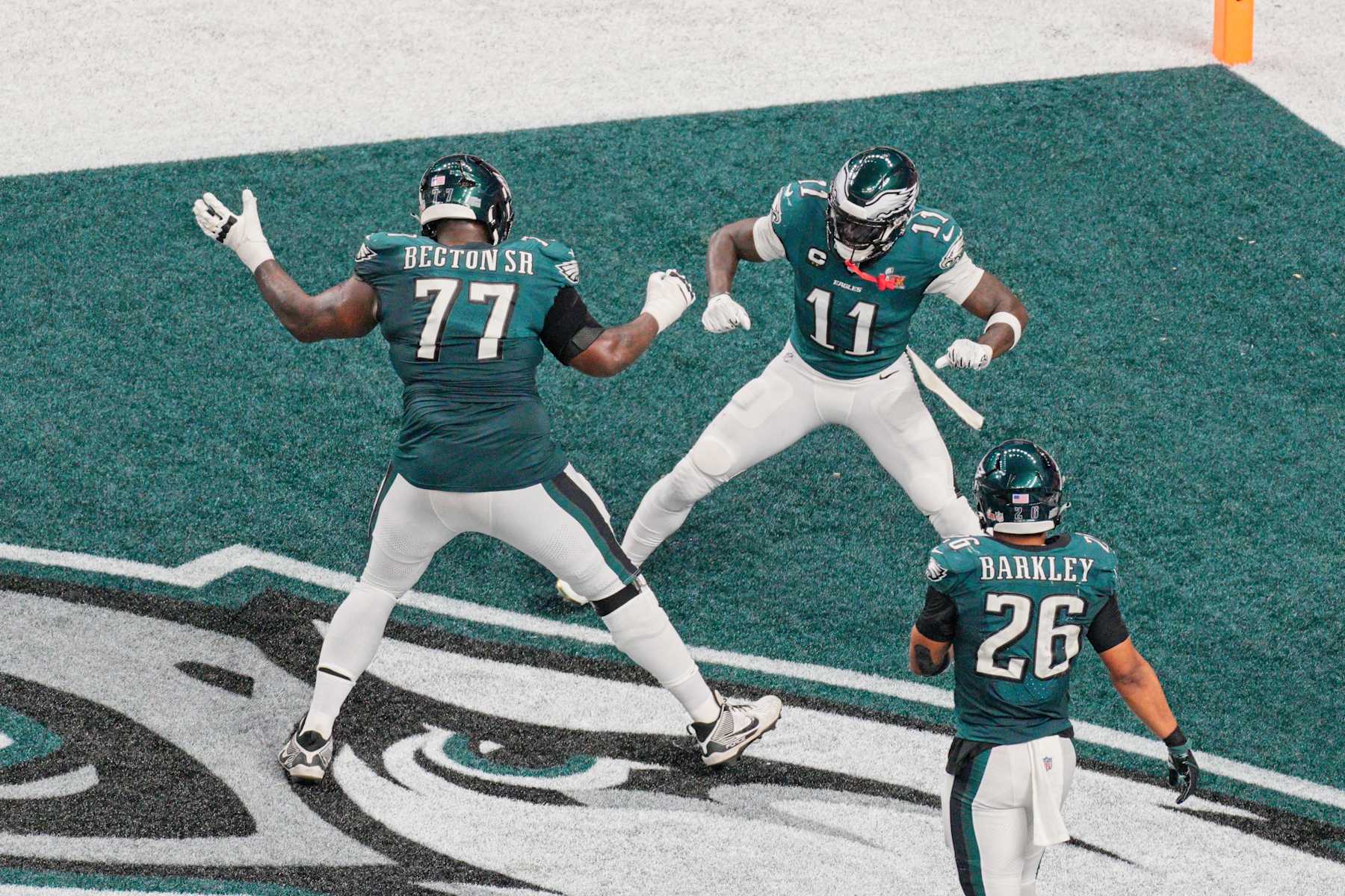 NEW ORLEANS, LA - FEBRUARY 09: Philadelphia Eagles wide receiver A.J. Brown (11) celebrates with Philadelphia Eagles offensive tackle Mekhi Becton (77) during Super Bowl LIX between the Philadelphia Eagles and the Kansas City Chiefs on February 9, 2025 at the Superdome in New Orleans, LA. (Photo by Andy Lewis/Icon Sportswire via Getty Images)