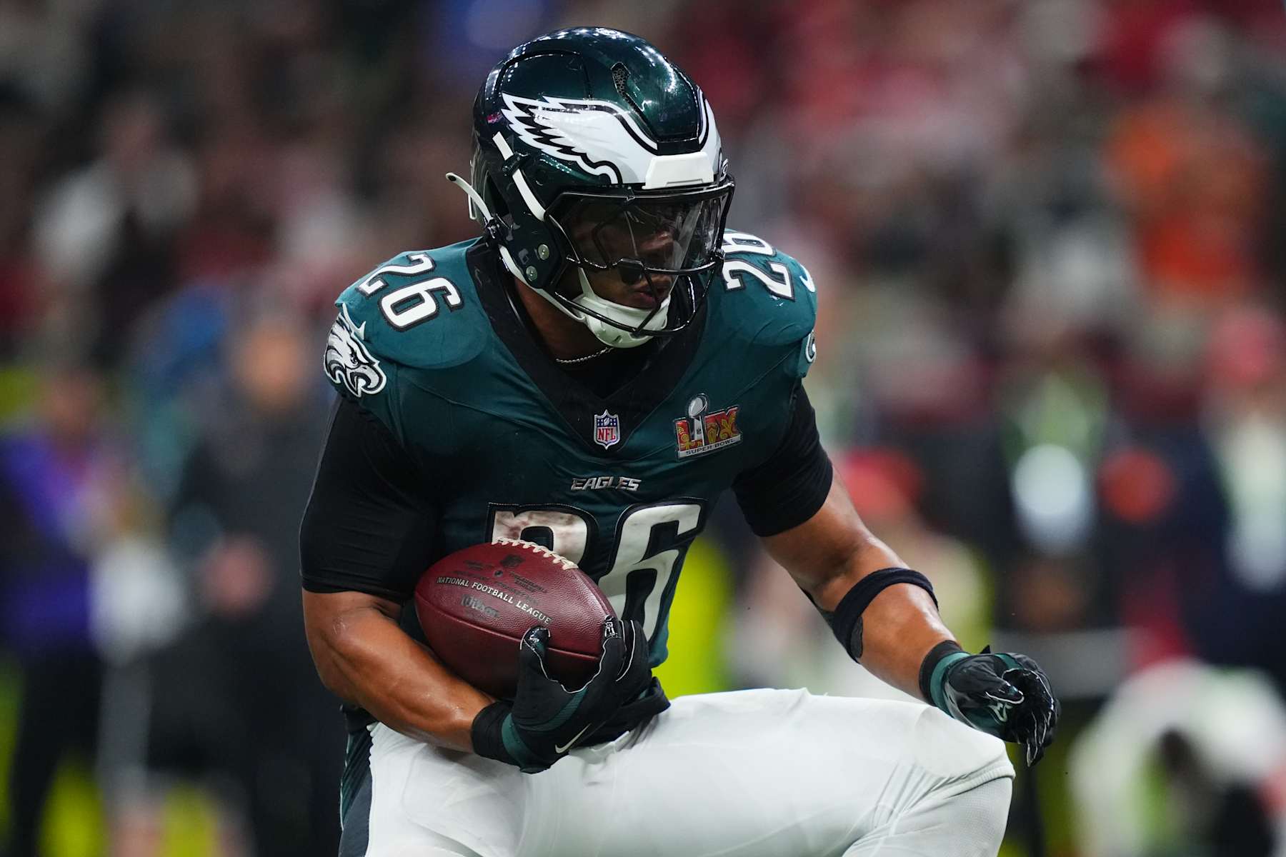 NEW ORLEANS, LA - FEBRUARY 09: Saquon Barkley #26 of the Philadelphia Eagles carries the ball against the Kansas City Chiefs during Super Bowl LIX at Caesars Superdome on February 9, 2025 in New Orleans, Louisiana. (Photo by Cooper Neill/Getty Images)