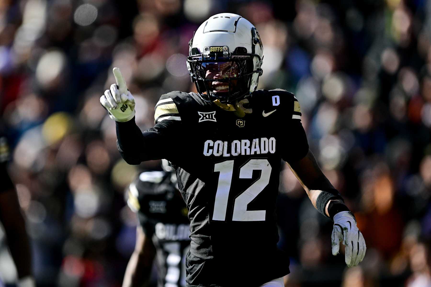 BOULDER, CO - NOVEMBER 29: Travis Hunter #12 of the Colorado Buffaloes celebrates after a score in the third quarter against the Oklahoma State Cowboys at Folsom Field on November 29, 2024 in Boulder, Colorado. (Photo by Dustin Bradford/Getty Images)