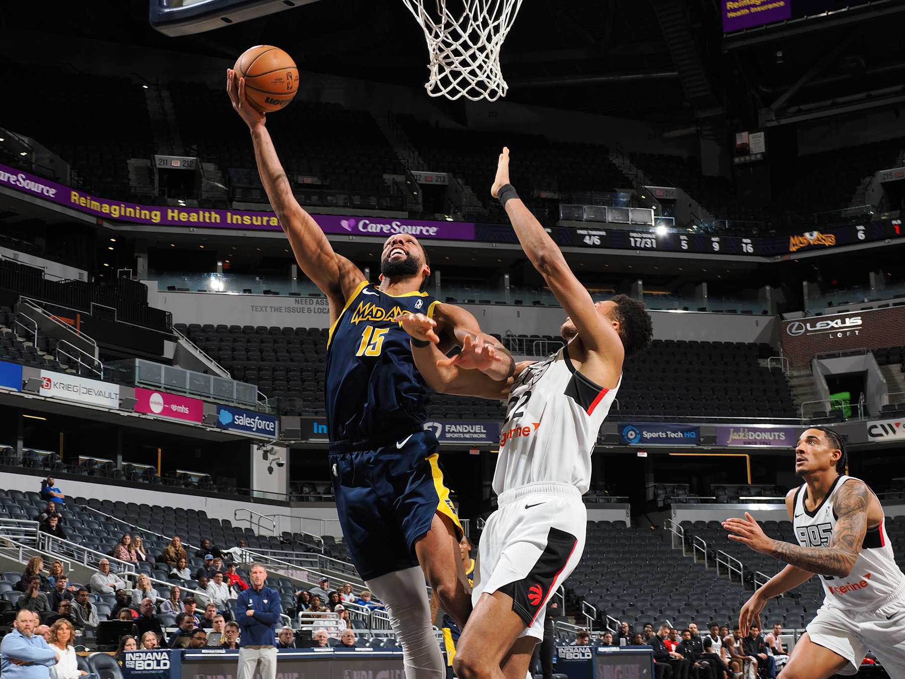 INDIANAPOLIS, IN - FEBRUARY 4: Jahill Okafor #15 of the Indiana Mad Ants shoots over Ulrich Chomche  #22 of the Raptors 905 on February 4, 2025 at Gainbridge Fieldhouse in Indianapolis, Indiana. NOTE TO USER: User expressly acknowledges and agrees that, by downloading and or using this photograph, User is consenting to the terms and conditions of the Getty Images License Agreement. Mandatory Copyright Notice: Copyright 2025 NBAE  (Photo by Ron Hoskins/NBAE via Getty Images)