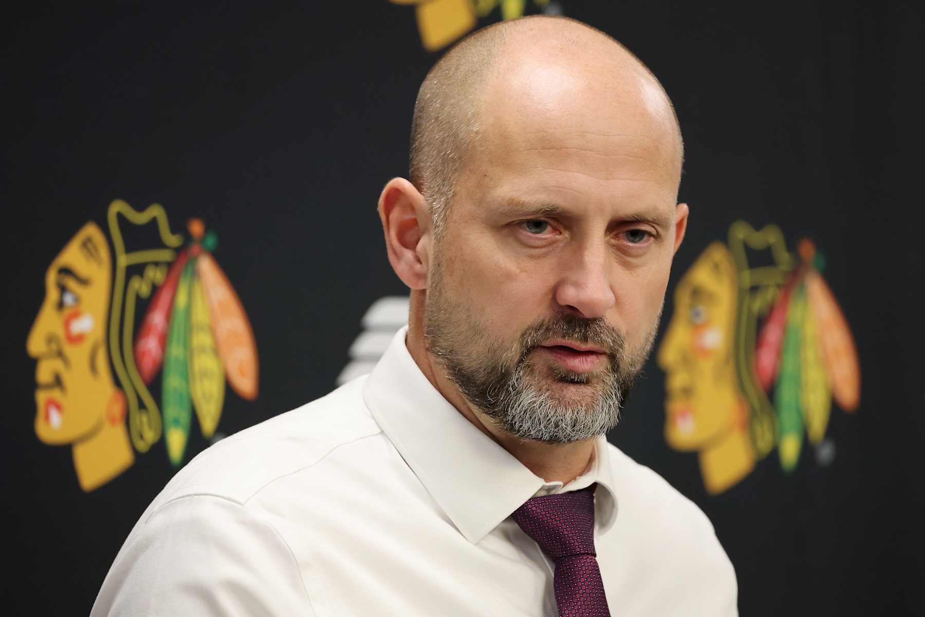 CHICAGO, ILLINOIS - DECEMBER 07: Interim head coach Anders Sorensen of the Chicago Blackhawks speaks to the media after losing to the Winnipeg Jets at the United Center on December 07, 2024 in Chicago, Illinois. (Photo by Michael Reaves/Getty Images)