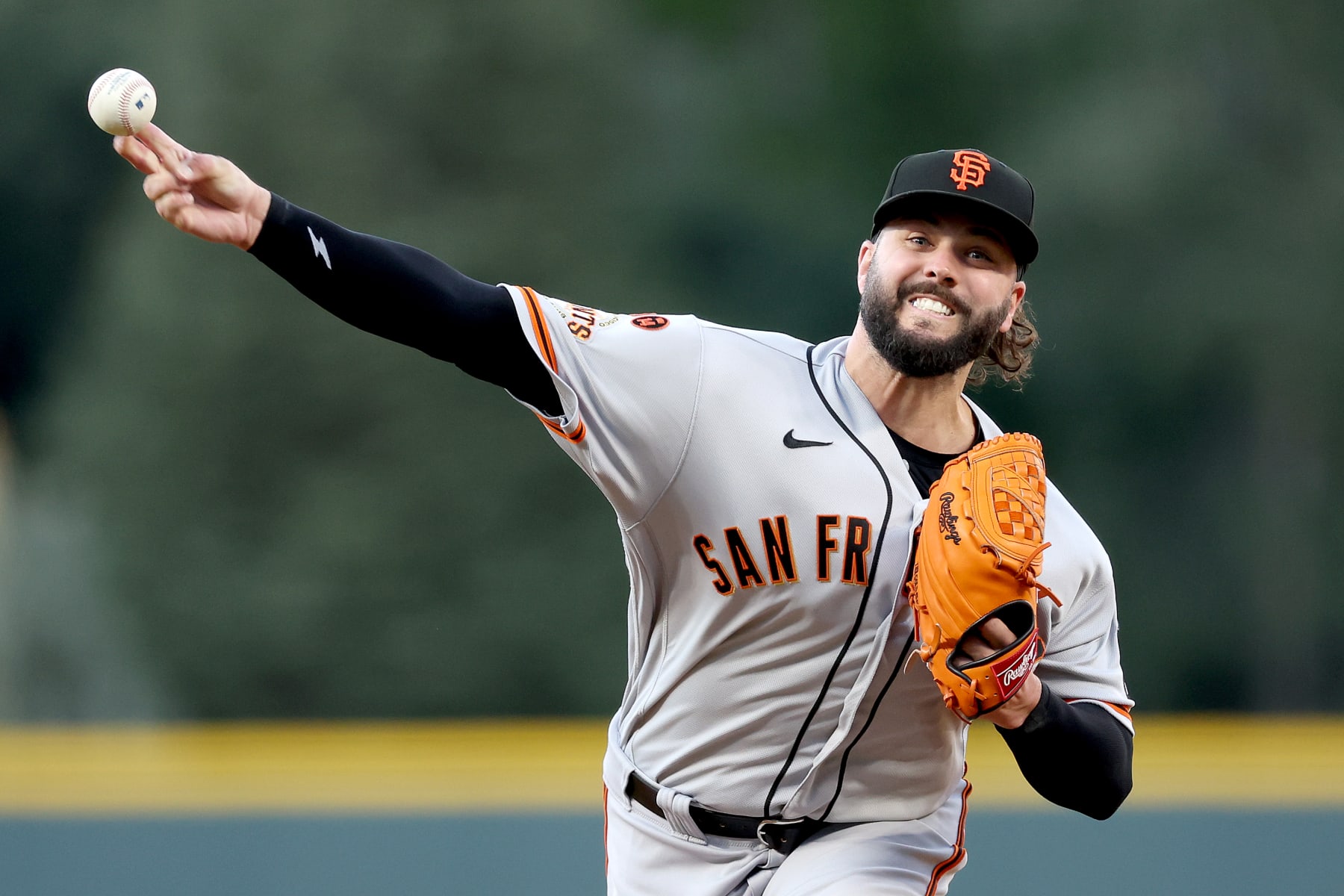 DENVER, COLORADO - SEPTEMBER 16: Pitcher Jakob Junis #34 of the San Francisco Giants throws against the Colorado Rockies in the first inning of Game Two of a doubleheader at Coors Field on September 16, 2023 in Denver, Colorado. (Photo by Matthew Stockman/Getty Images)