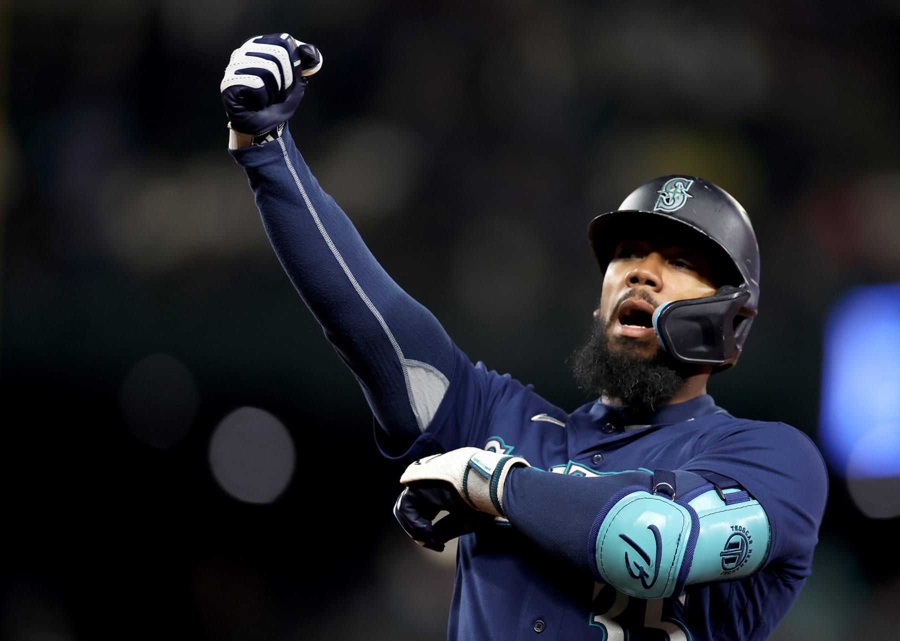 SEATTLE, WASHINGTON - SEPTEMBER 26: Teoscar Hernandez #35 of the Seattle Mariners reacts after his RBI single against the Houston Astros at T-Mobile Park on September 26, 2023 in Seattle, Washington. (Photo by Steph Chambers/Getty Images)