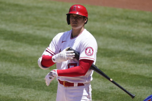 Los Angeles Angels pinch hitter Shohei Ohtani wears a jersey with his  nickname SHOWTIME on the back as he bats in the eighth inning during the  Major League Baseball game against the