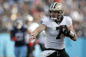 Saints' Taysom Hill carted off the field at Washington after