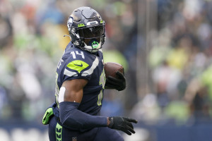 Seattle Seahawks running back Marshawn Lynch (24) holds a bottle